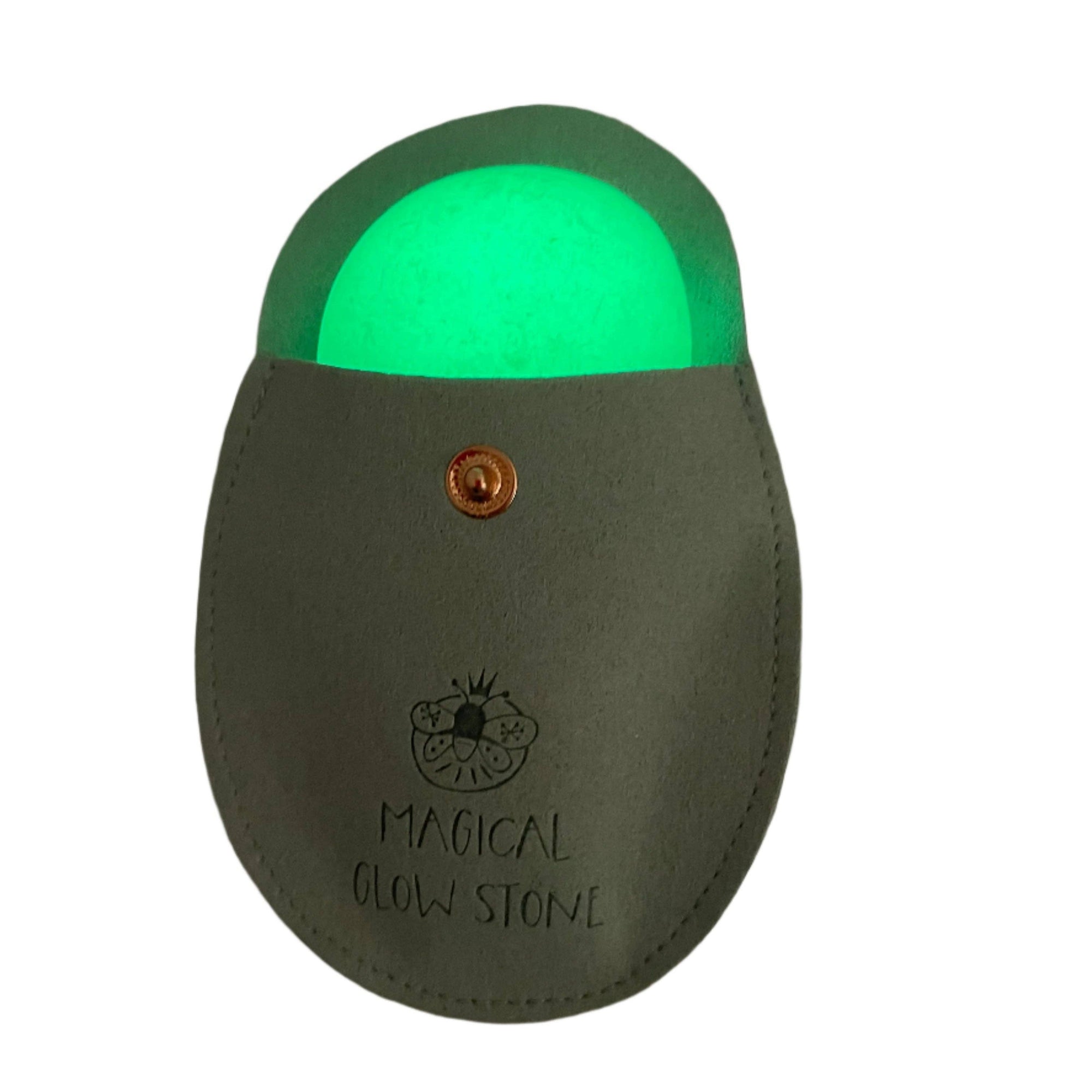 Green glowing stone in a gray case with 'Magical Glow Stone' text on a white background