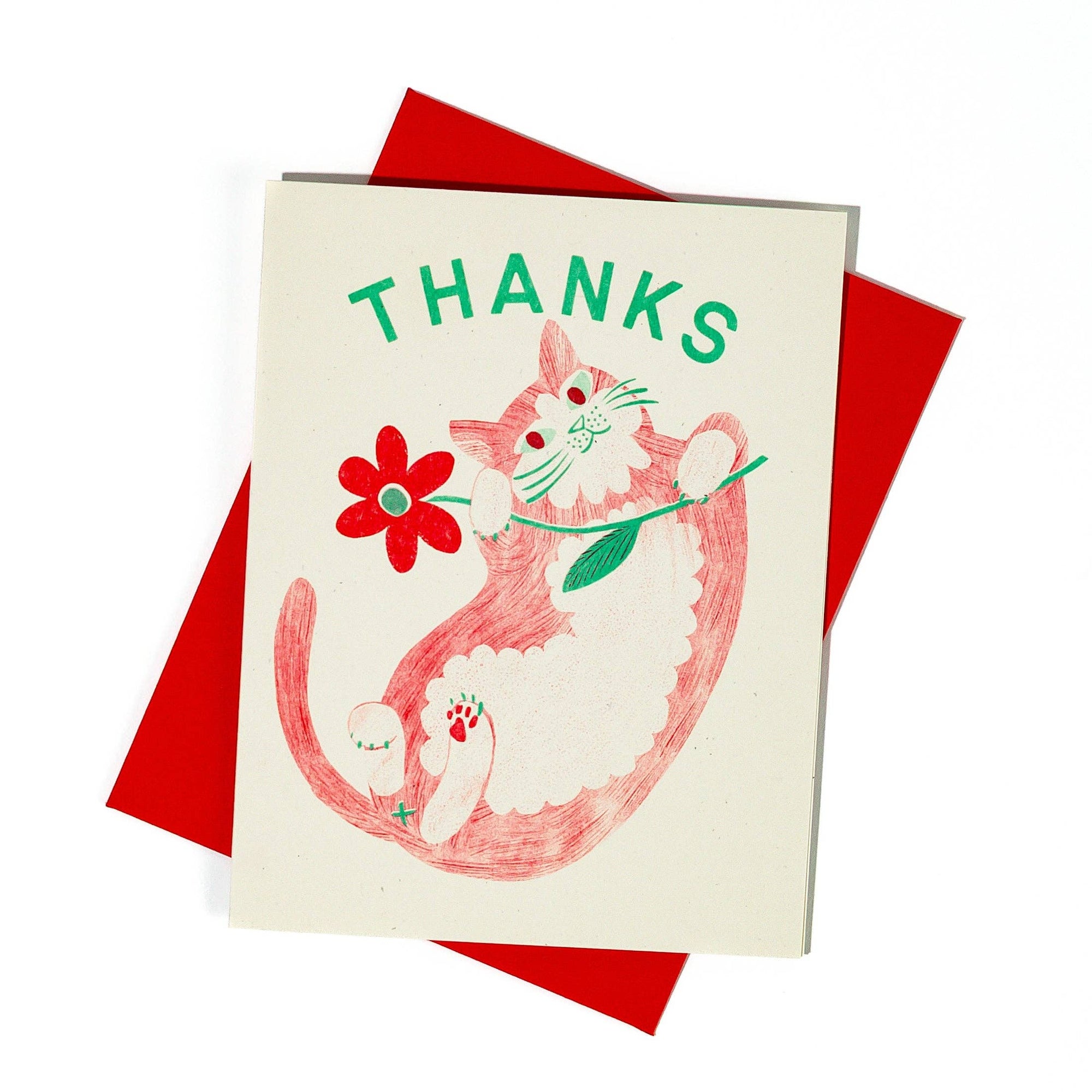 Card with a cat illustration and 'THANKS' text on a red envelope