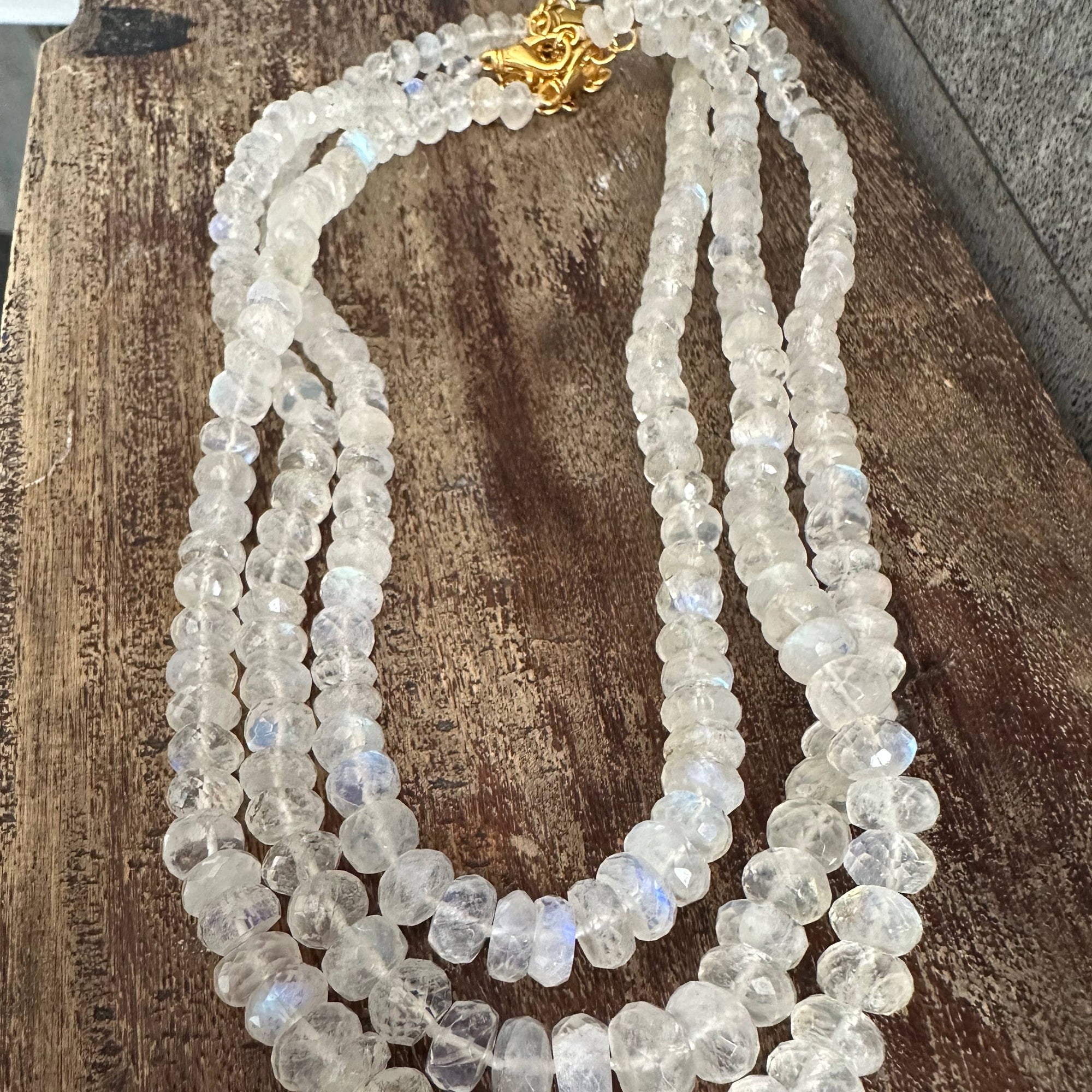 Beaded necklace on a wooden surface