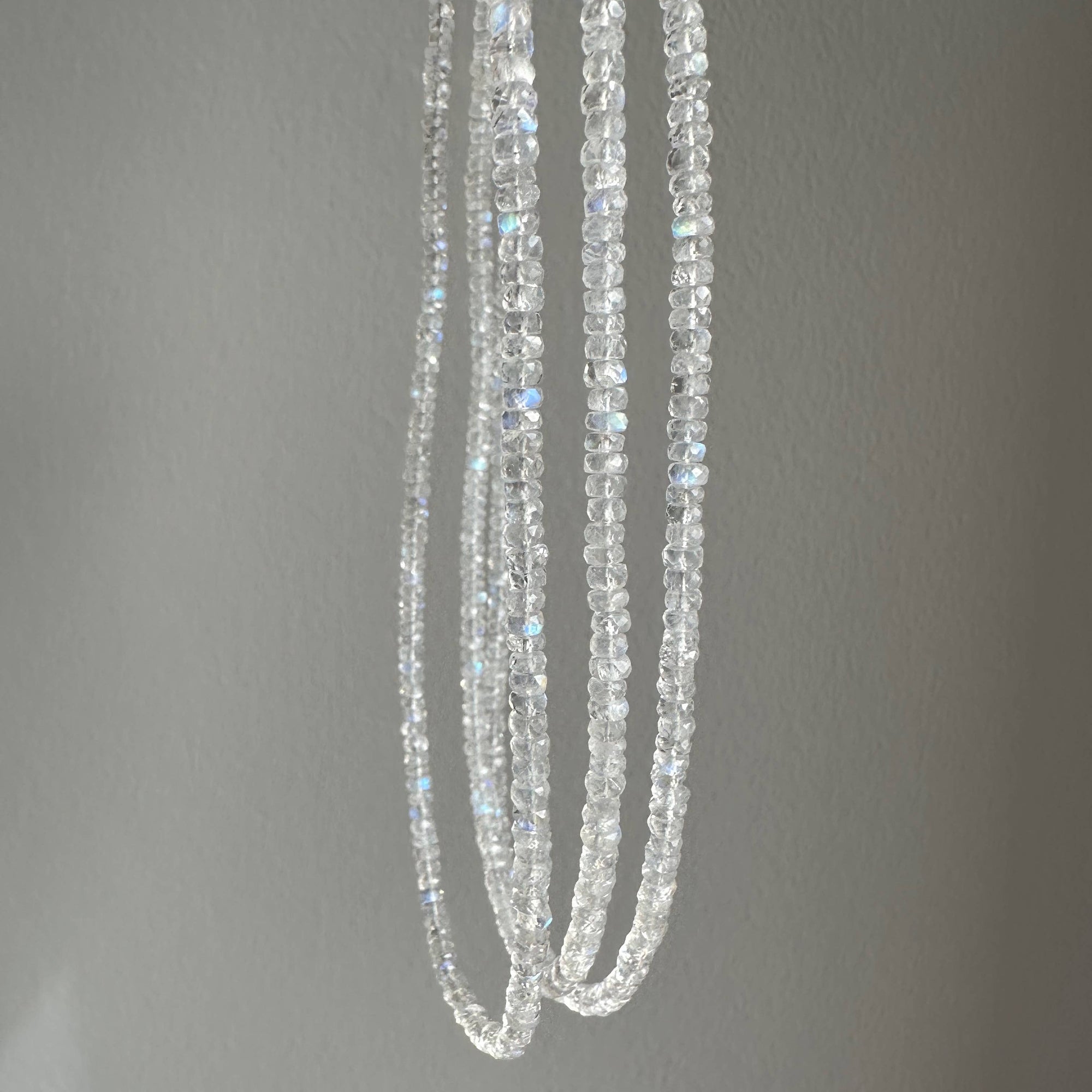 Beaded necklace on a gray background