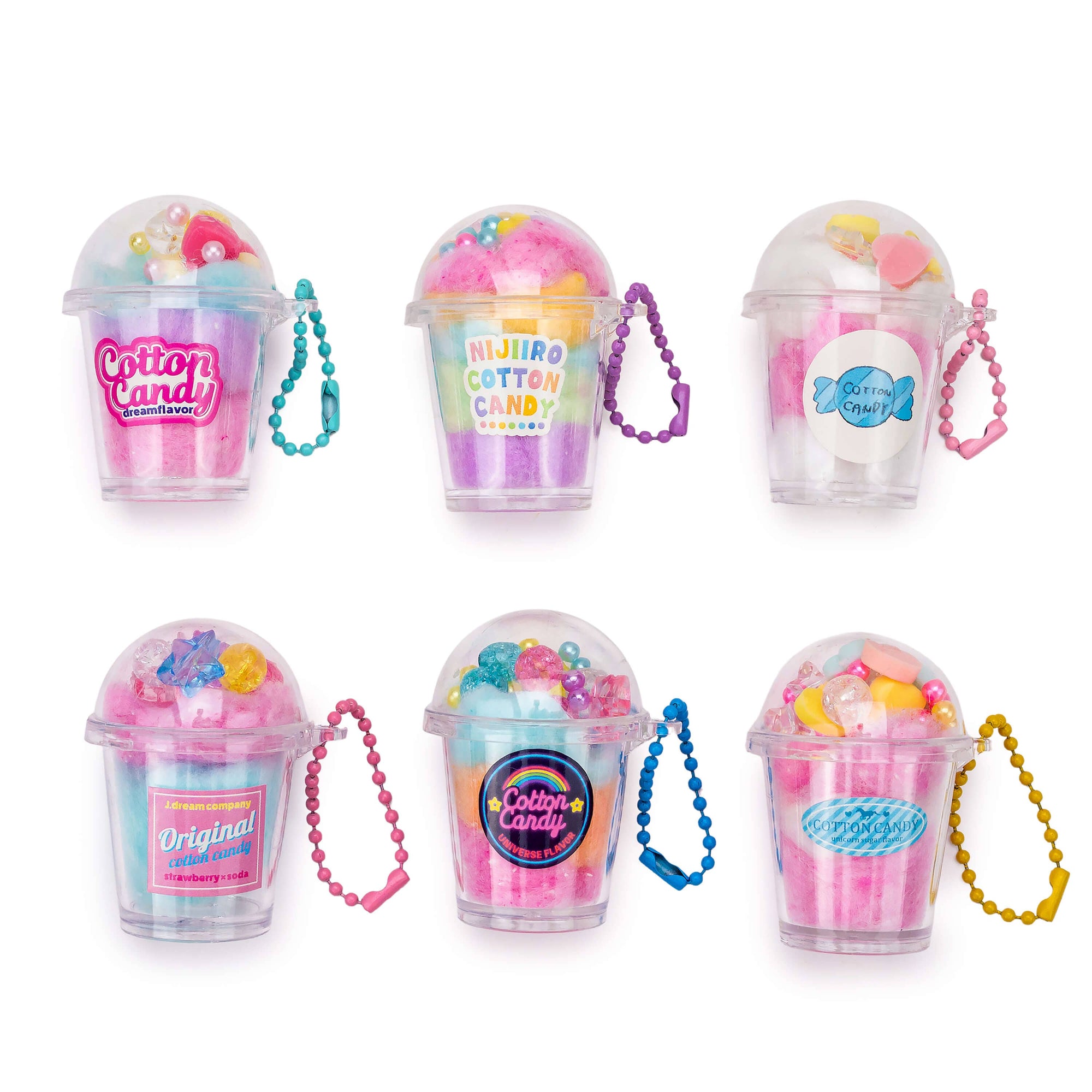 Set of six colorful cotton candy toys in transparent cups with decorative strings on a white background.