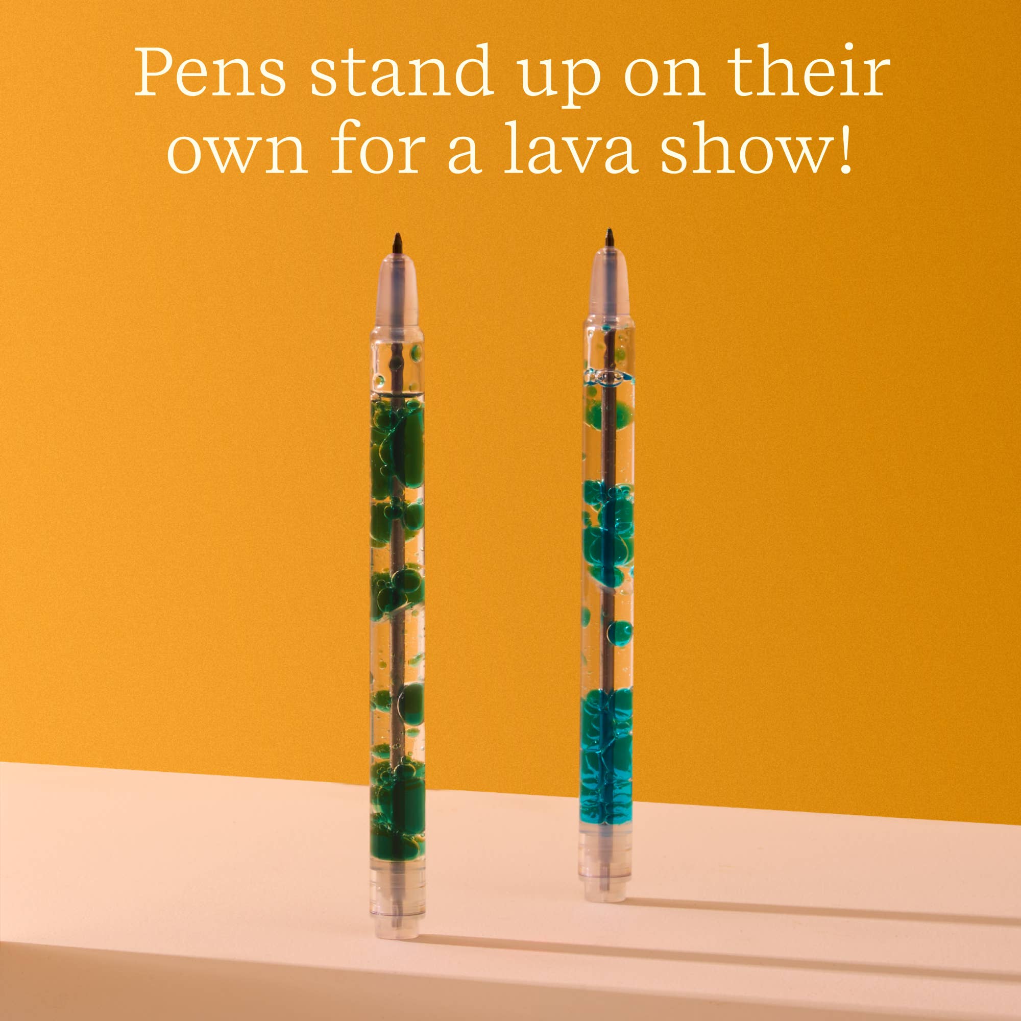 Two pens with lava inside on a yellow background with text.