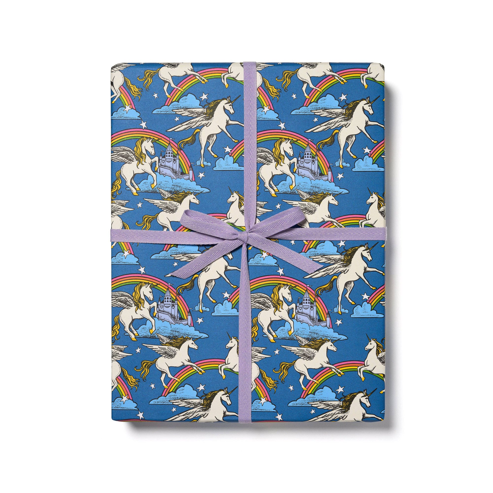Gift wrap with unicorn and rainbow pattern on a blue background