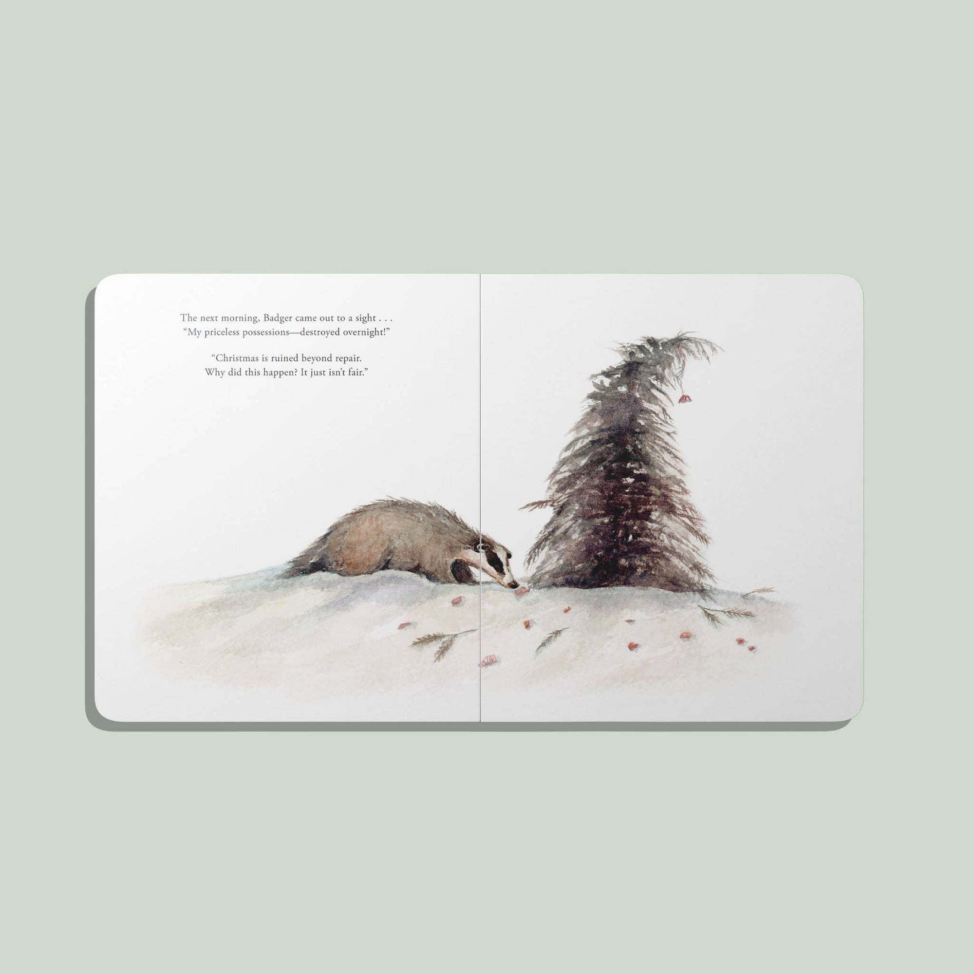 Illustrated book page with a badger and tree in a snowy landscape