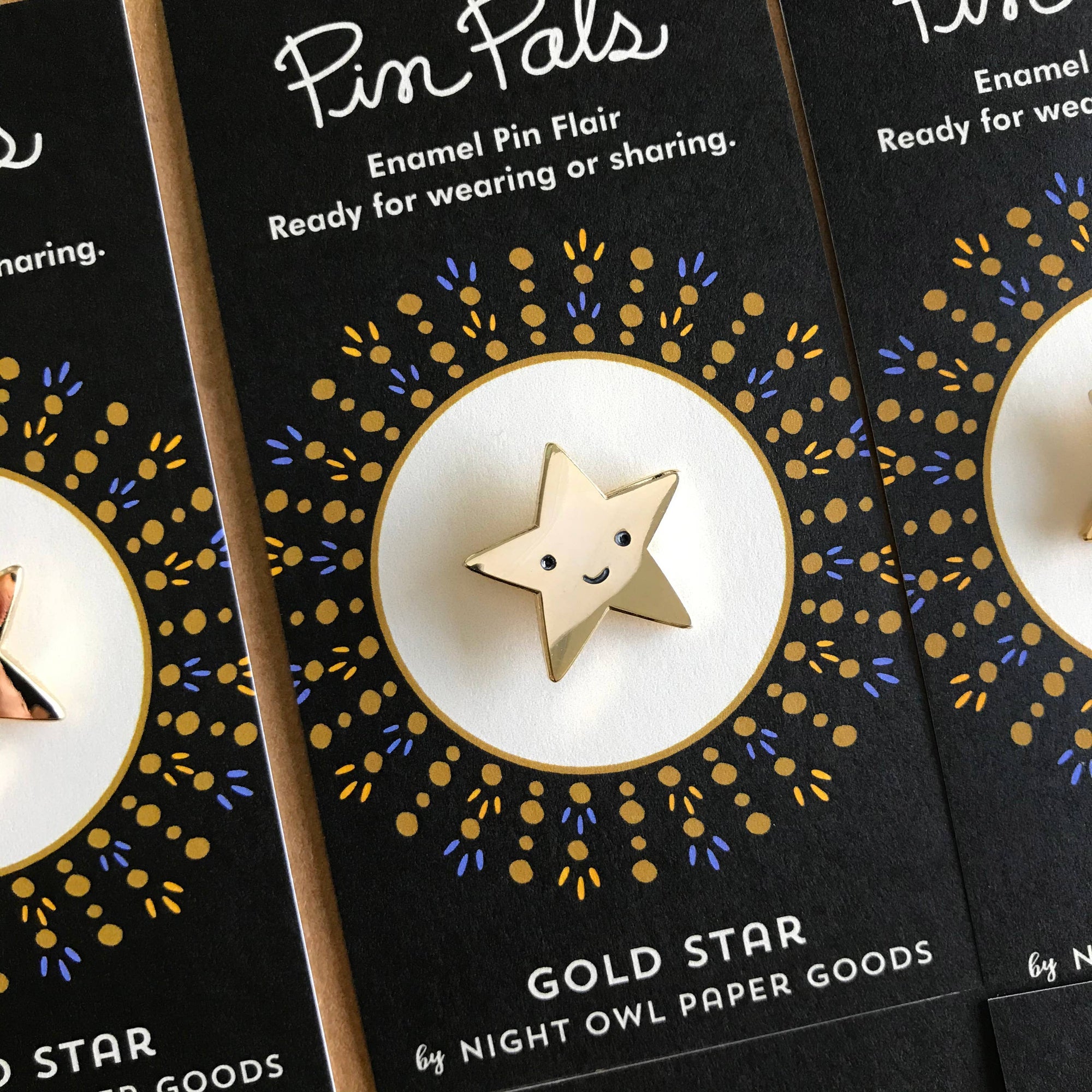 Gold star pin on a black card with 'Pin Pals' branding