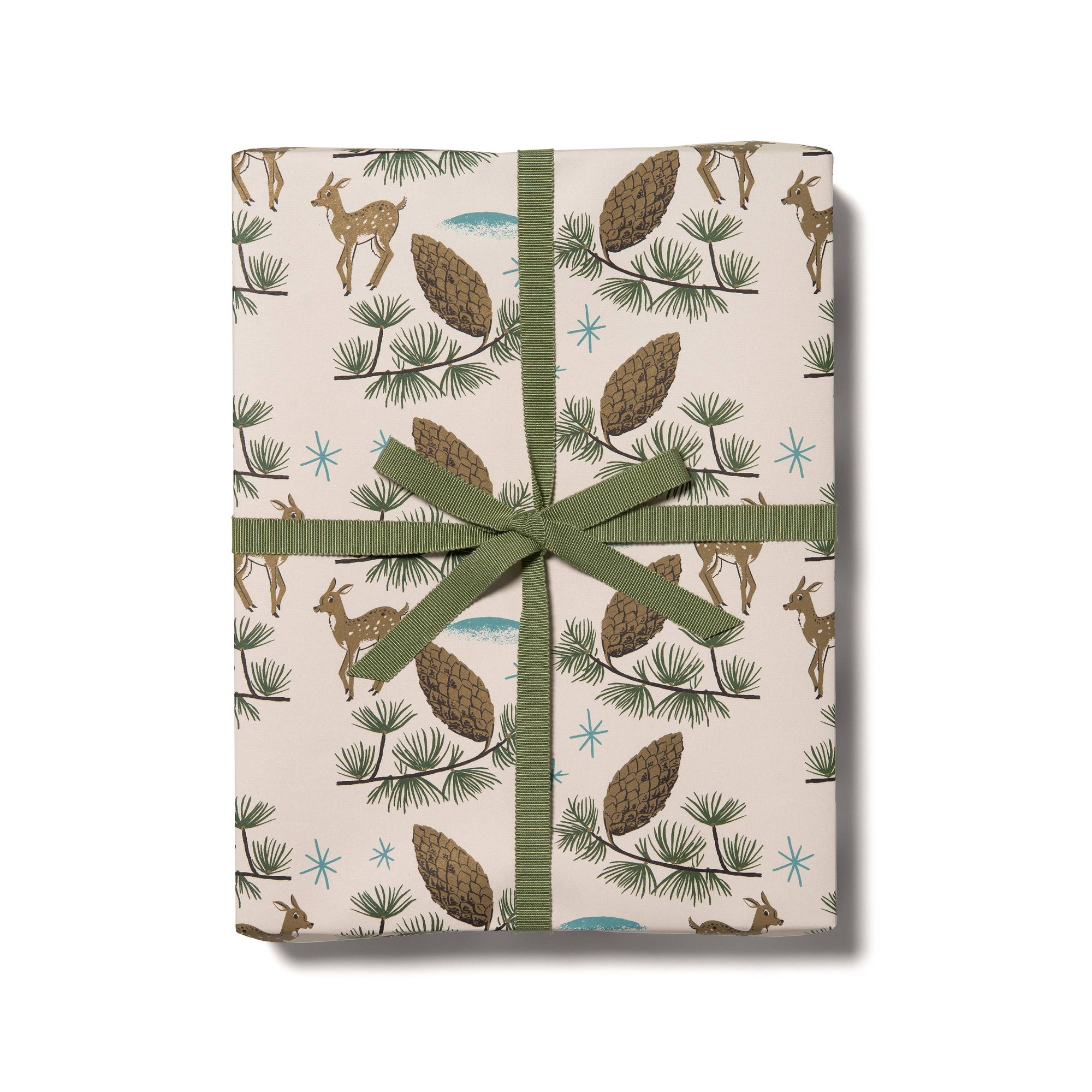 Gift box wrapped in paper with nature-themed design and green ribbon on a white background