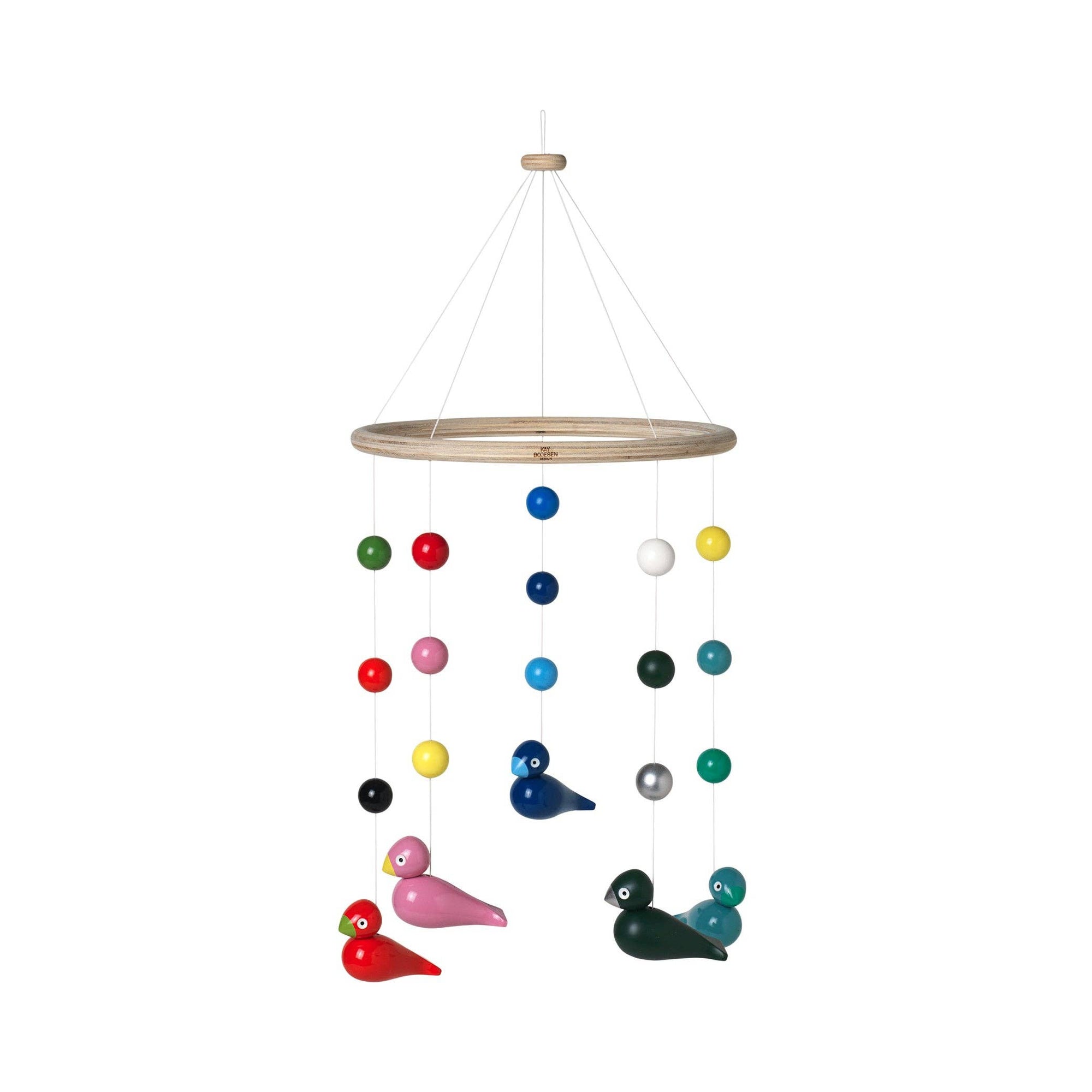 Colorful bird-shaped mobile hanging from a circular wooden frame on a white background
