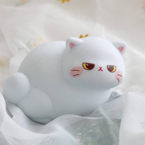 Plush toy cat with a soft texture on a white background