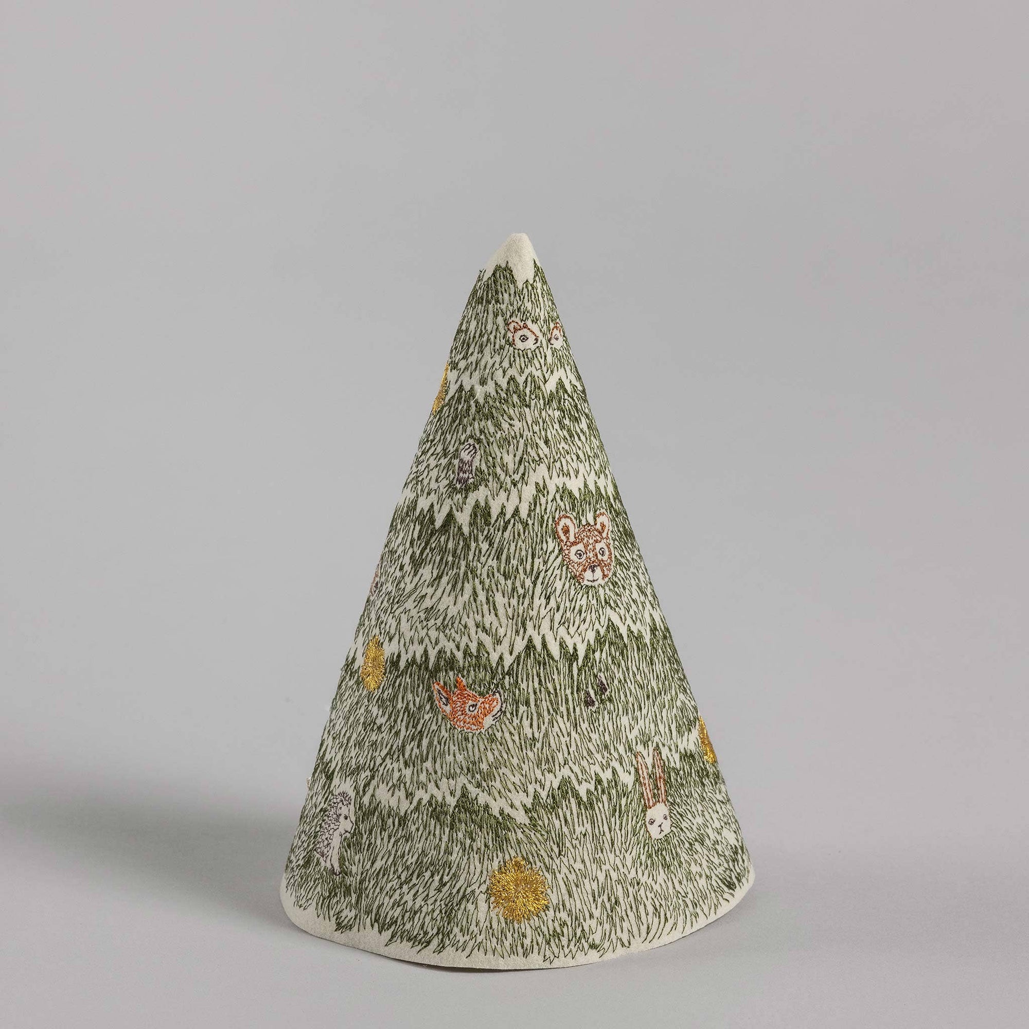 Decorative cone-shaped object with animal illustrations on a gray background