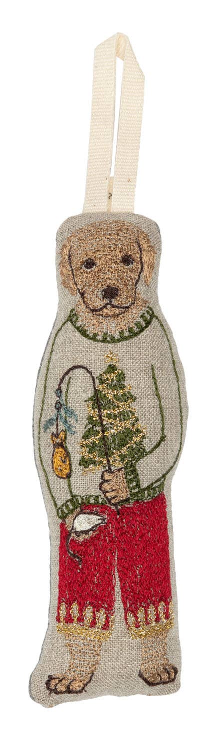 Decorative bear ornament with a sweater, tree, and fishing rod on a white background