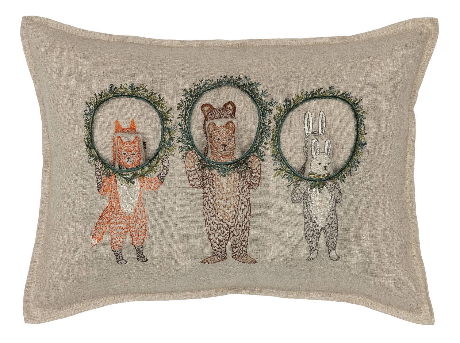 Decorative pillow with animal-themed wreaths on a beige background