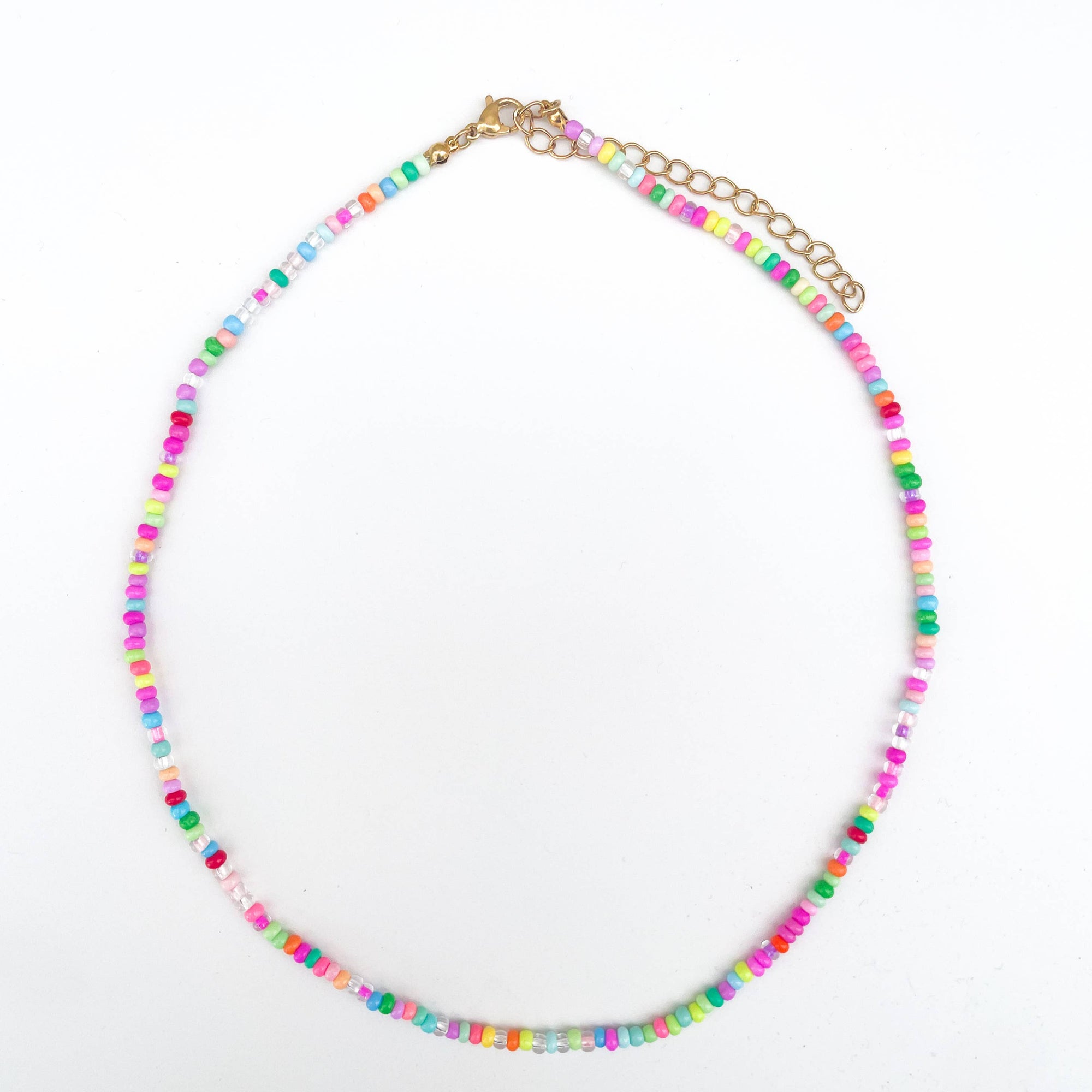 Colorful beaded necklace on a white background