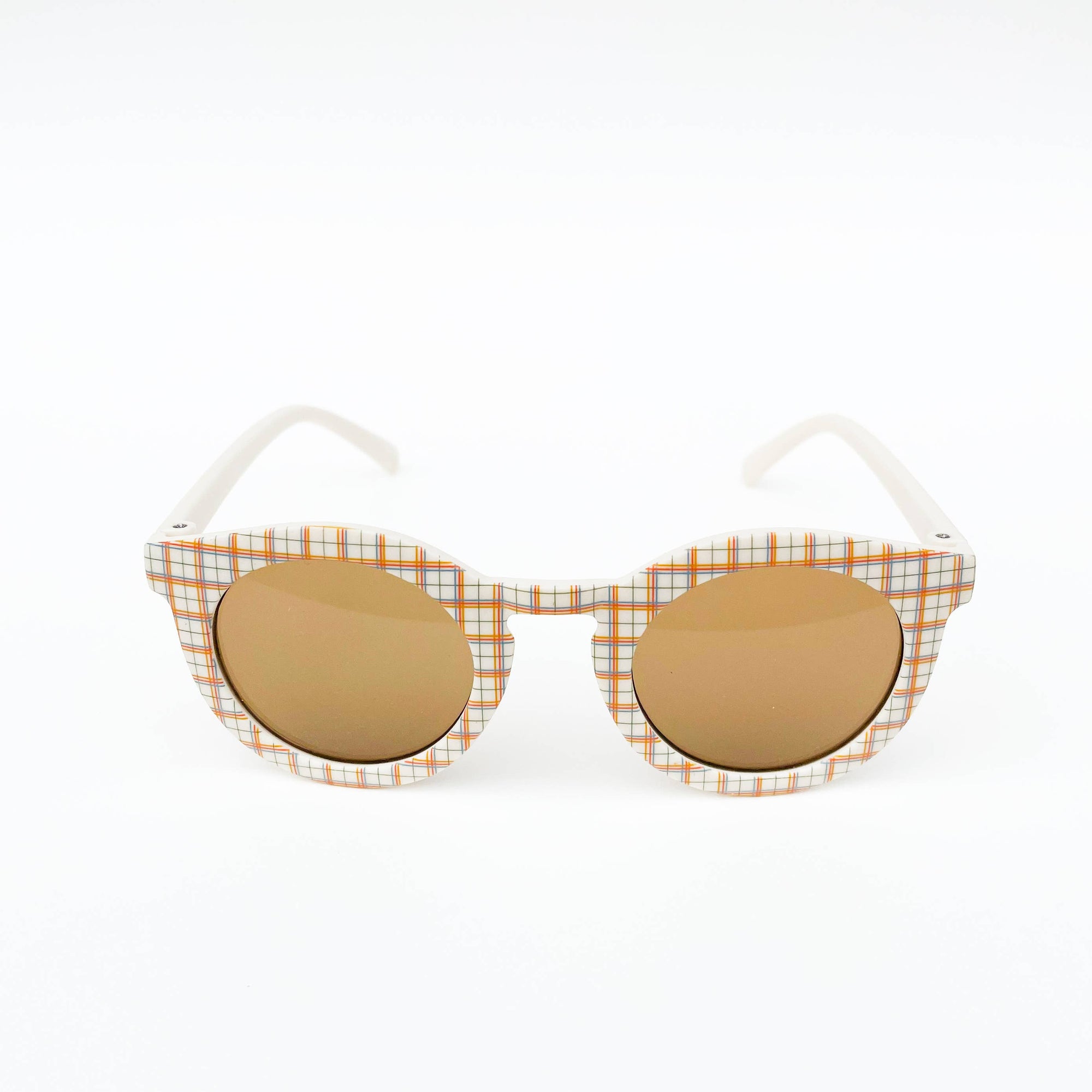 Sunglasses with checkered frame and round lenses on a white background