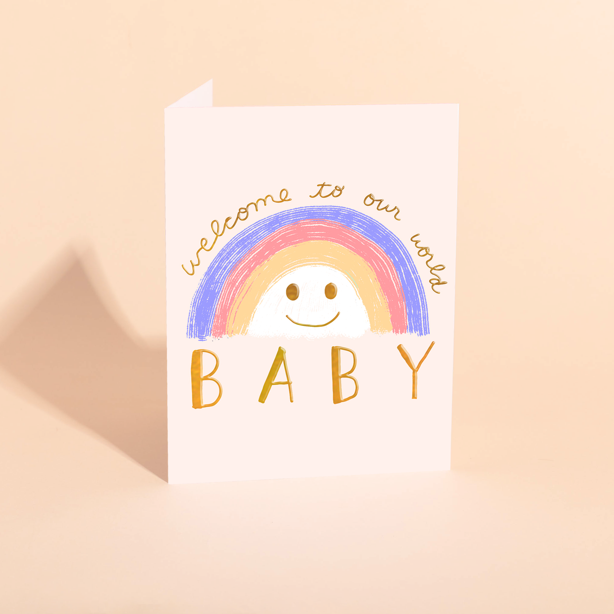 Baby shower card with rainbow and text 'welcome to our world BABY' on a beige background