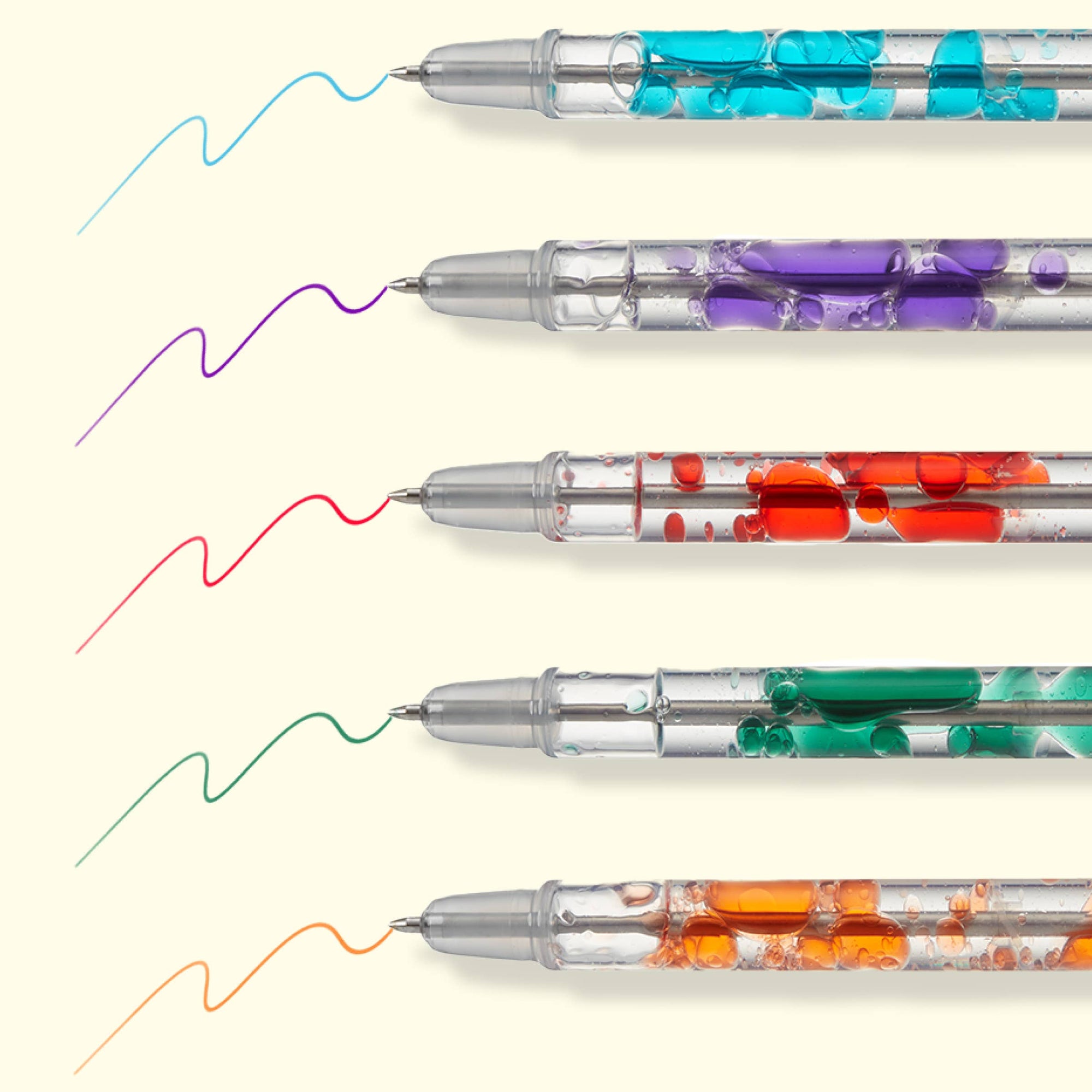 Colorful pens with wavy lines on a white background