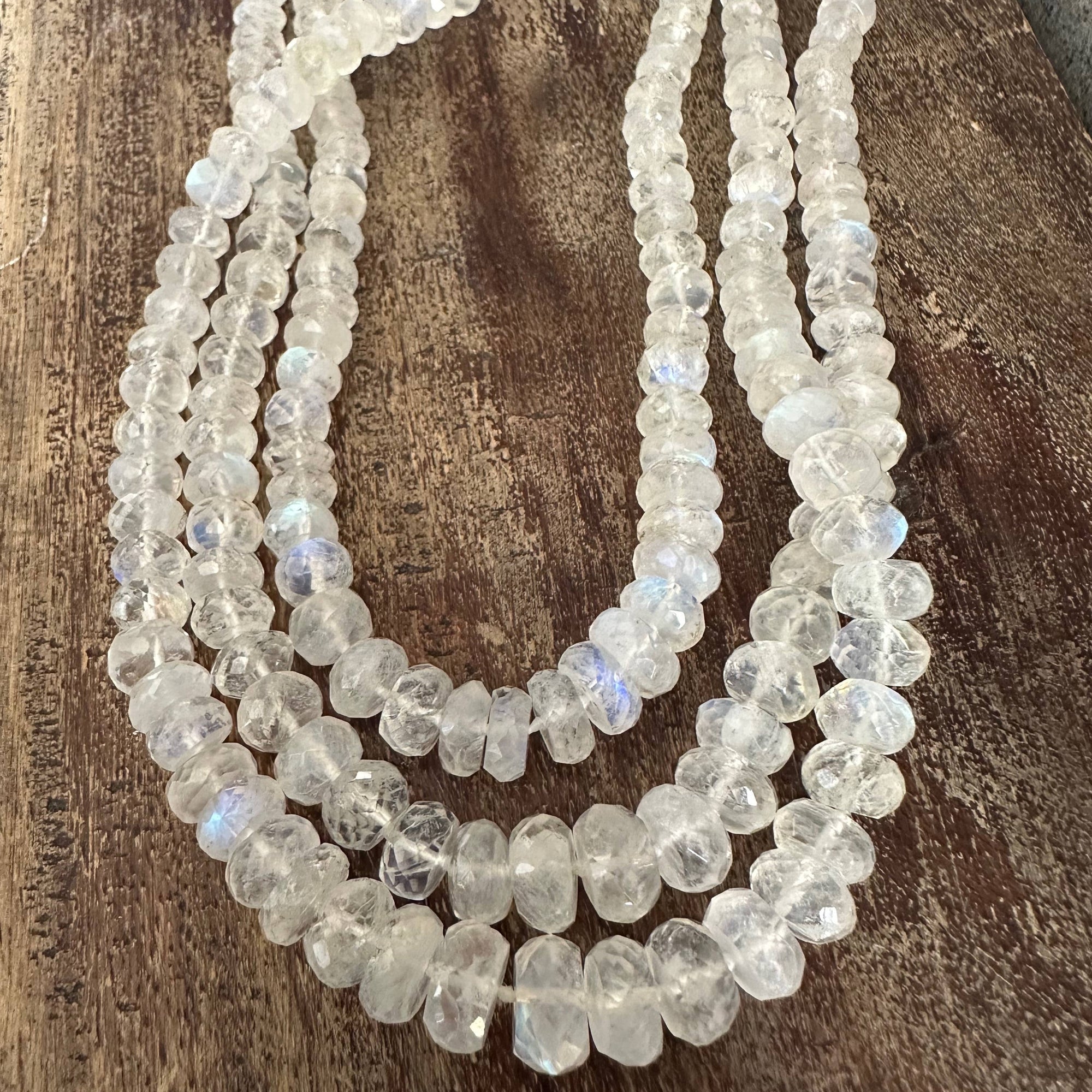 Beaded necklace on a wooden surface