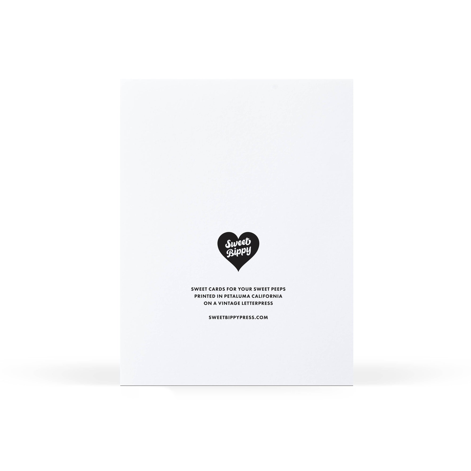 White envelope with black text and logo on a white background