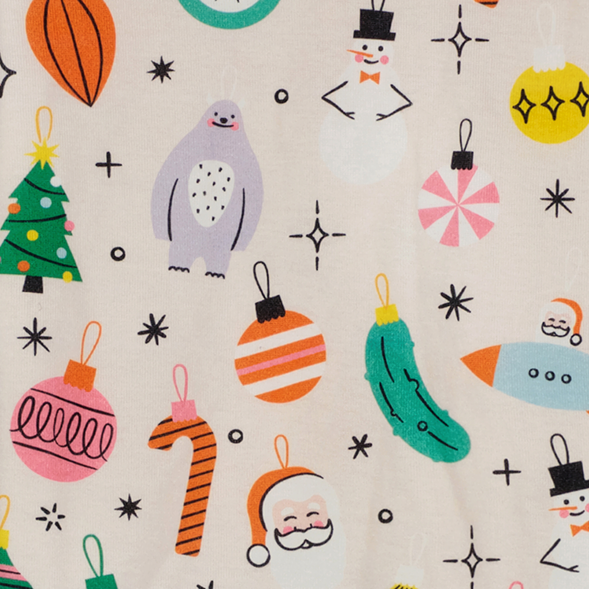 Colorful pattern of Christmas-themed illustrations on a beige cloth