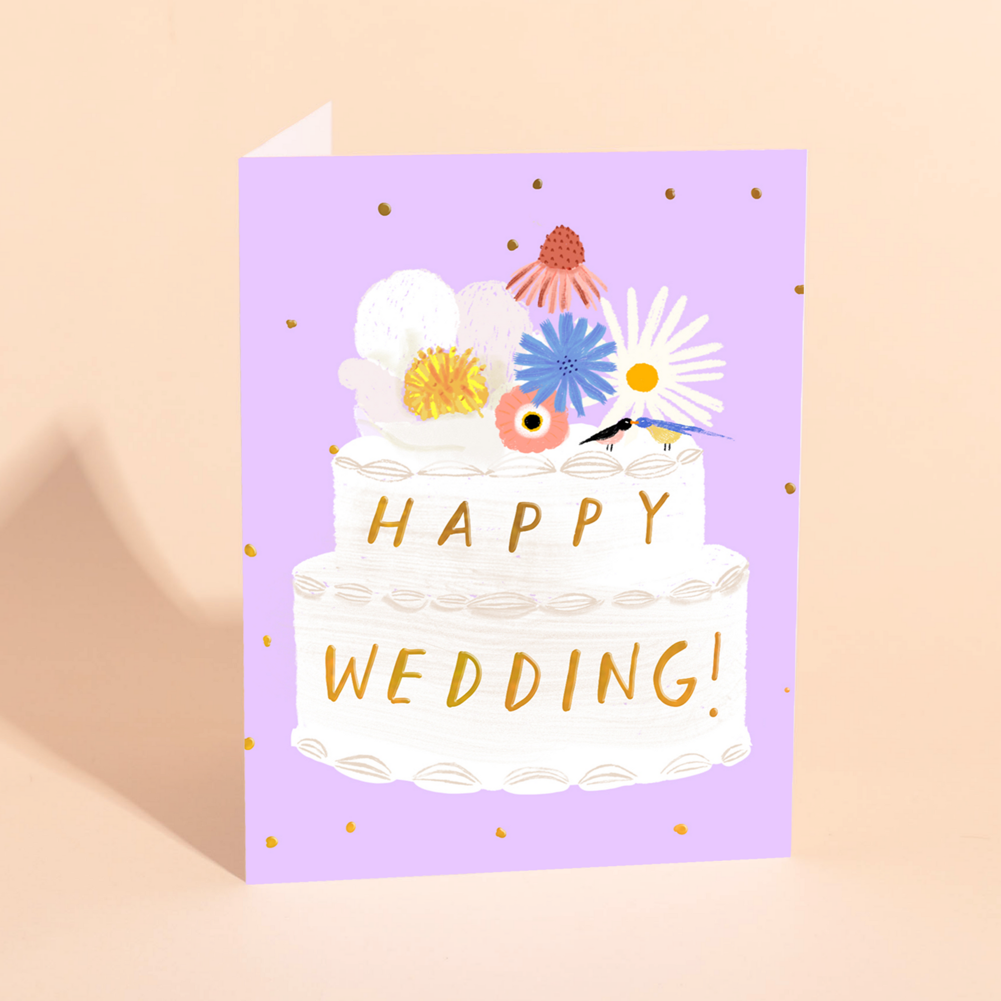 Greeting card with a cake illustration and 'Happy Wedding!' text on a purple background