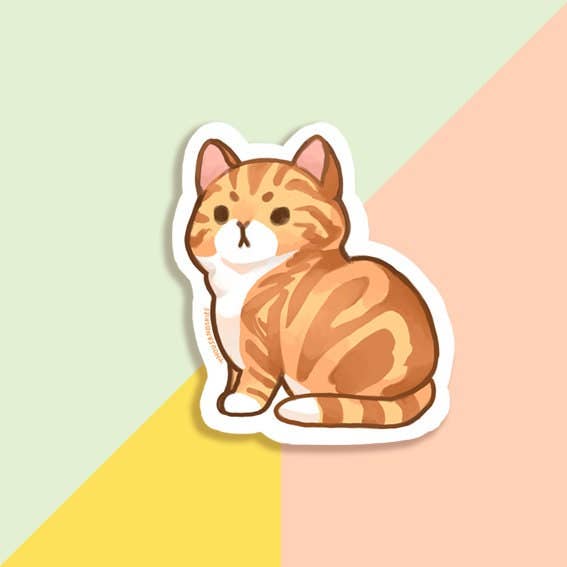 Sticker of a cartoon cat on a colorful geometric background