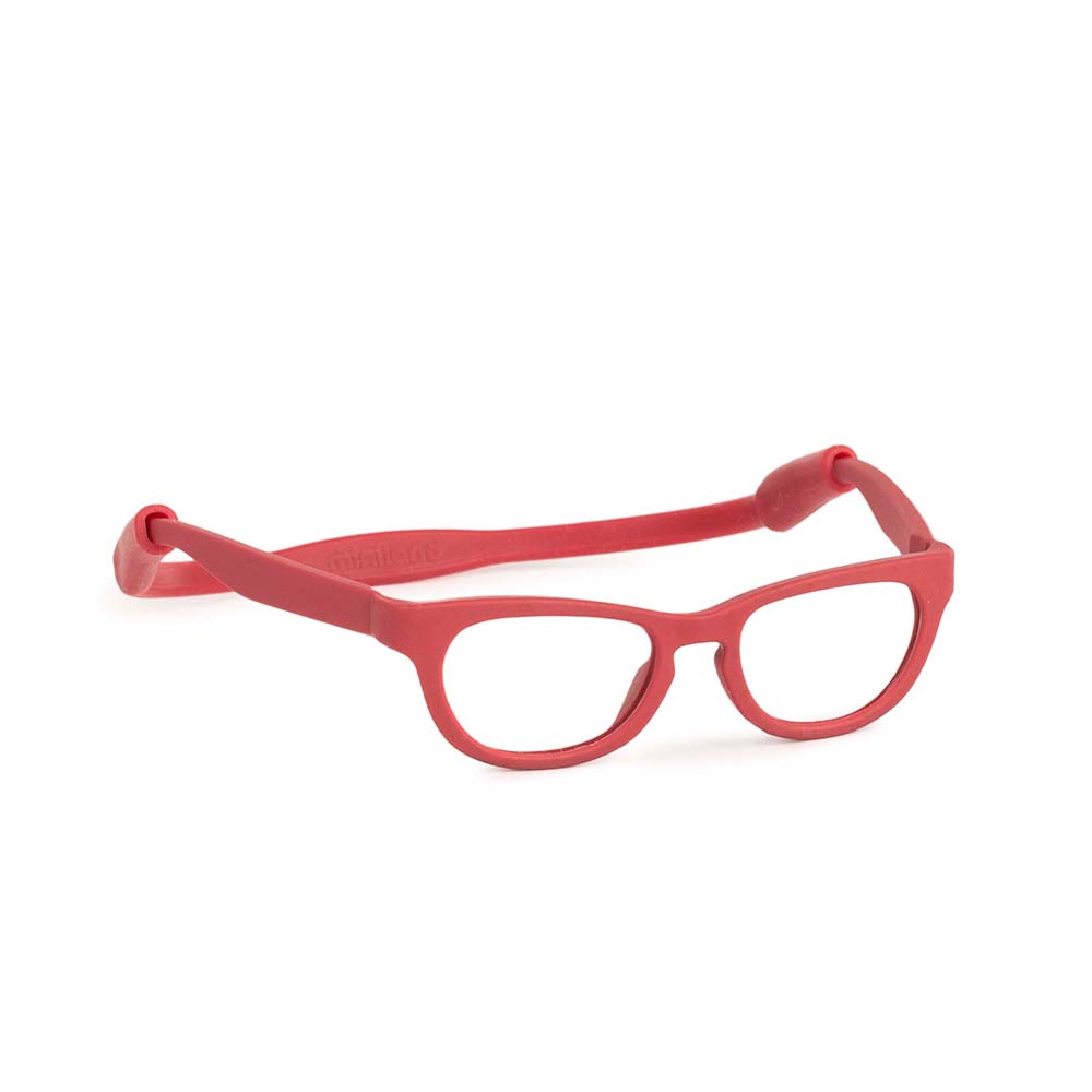 Red doll's eyeglasses on a white background