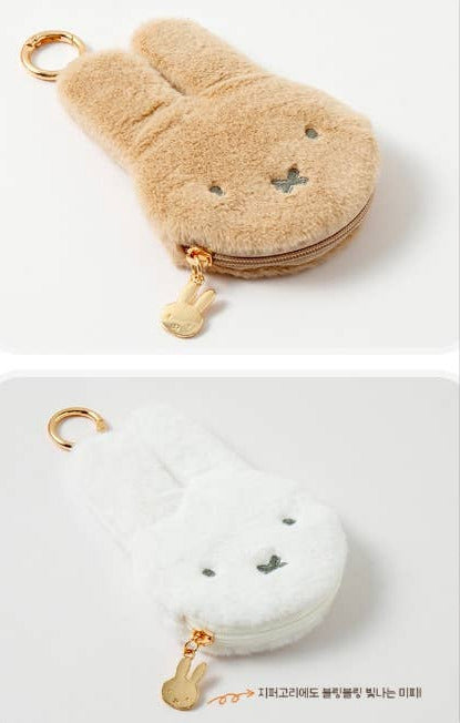 Fluffy bunny-shaped coin purse on a white background