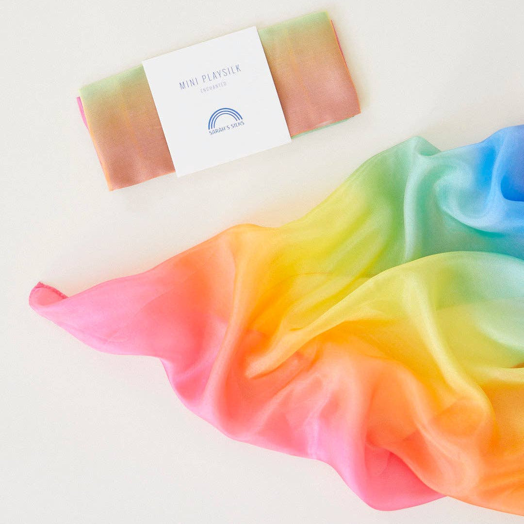 Colorful tie-dye fabric with a box labeled 'Rainbow' on a white background