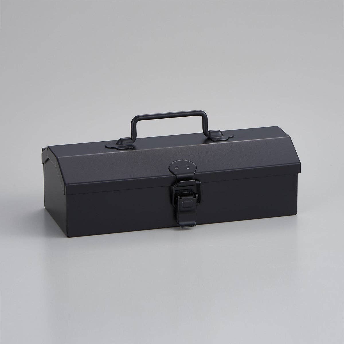 Black metal toolbox on a light gray background