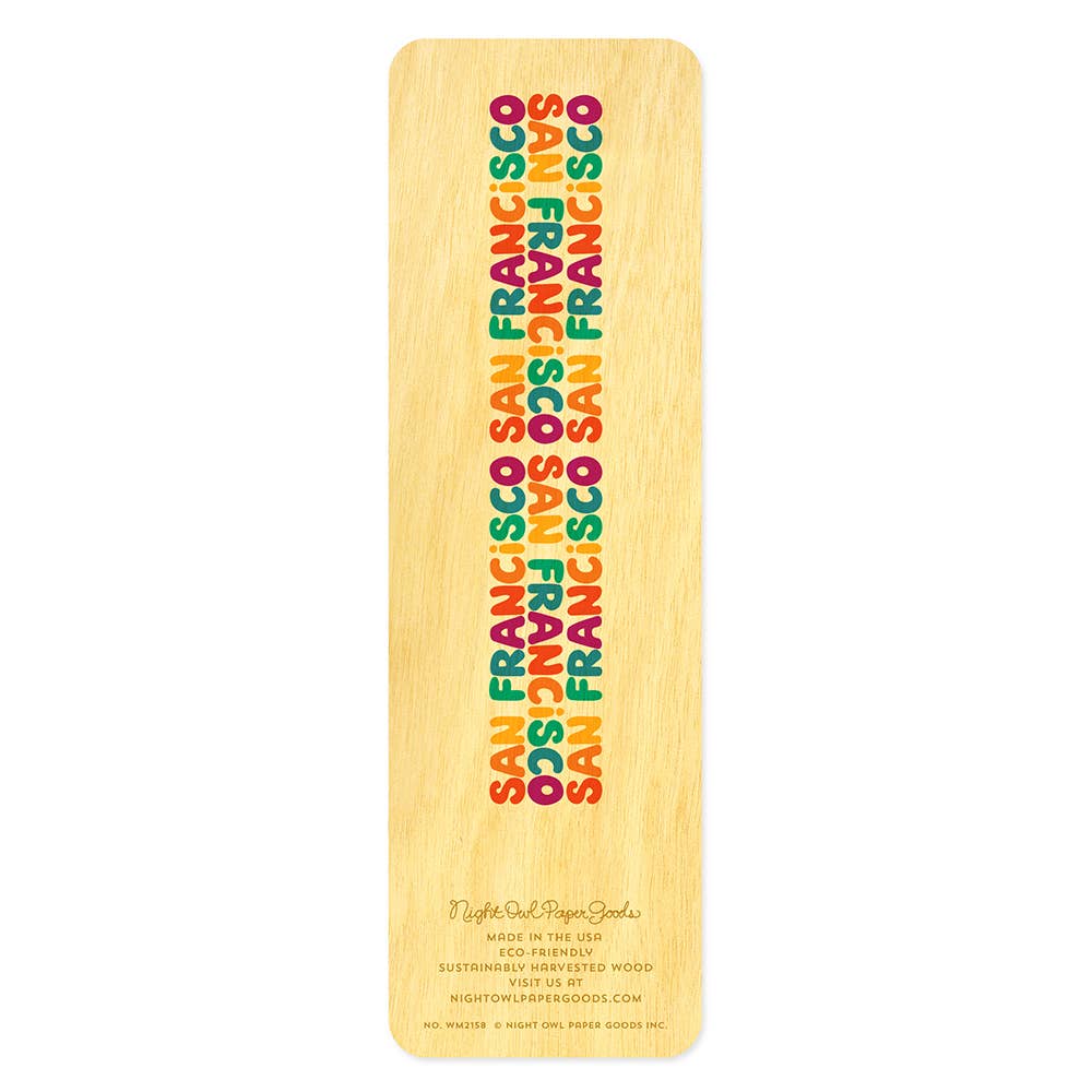 Wooden cutting board with 'San Francisco' text in colorful letters on a white background