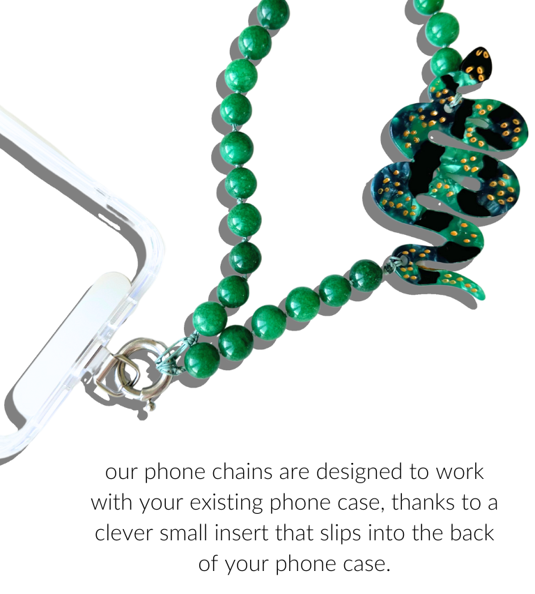 Green beaded phone chain with decorative snake design on a white background
