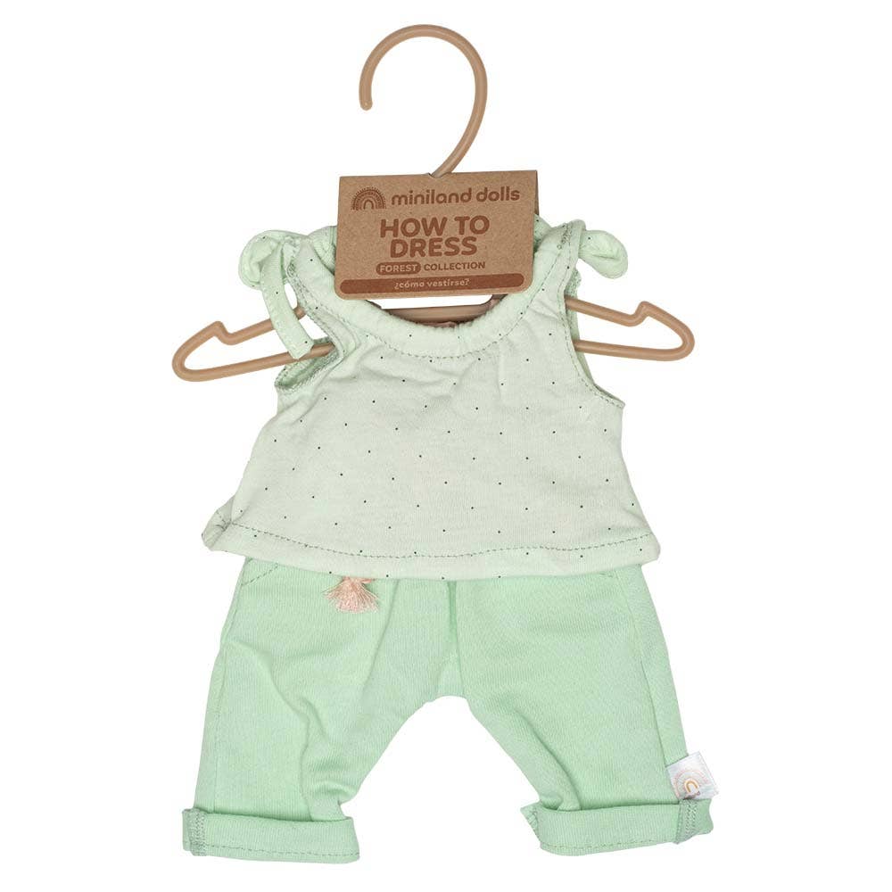 Light green doll outfit with top and pants on a hanger, featuring 'miniland dolls' packaging.