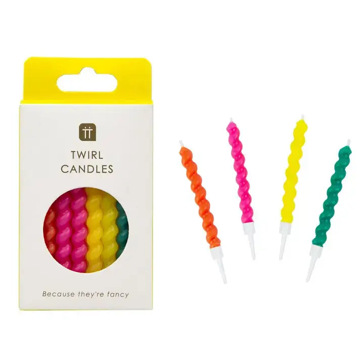 Colorful swirl candles with packaging labeled 'Twirl Candles' on a white background