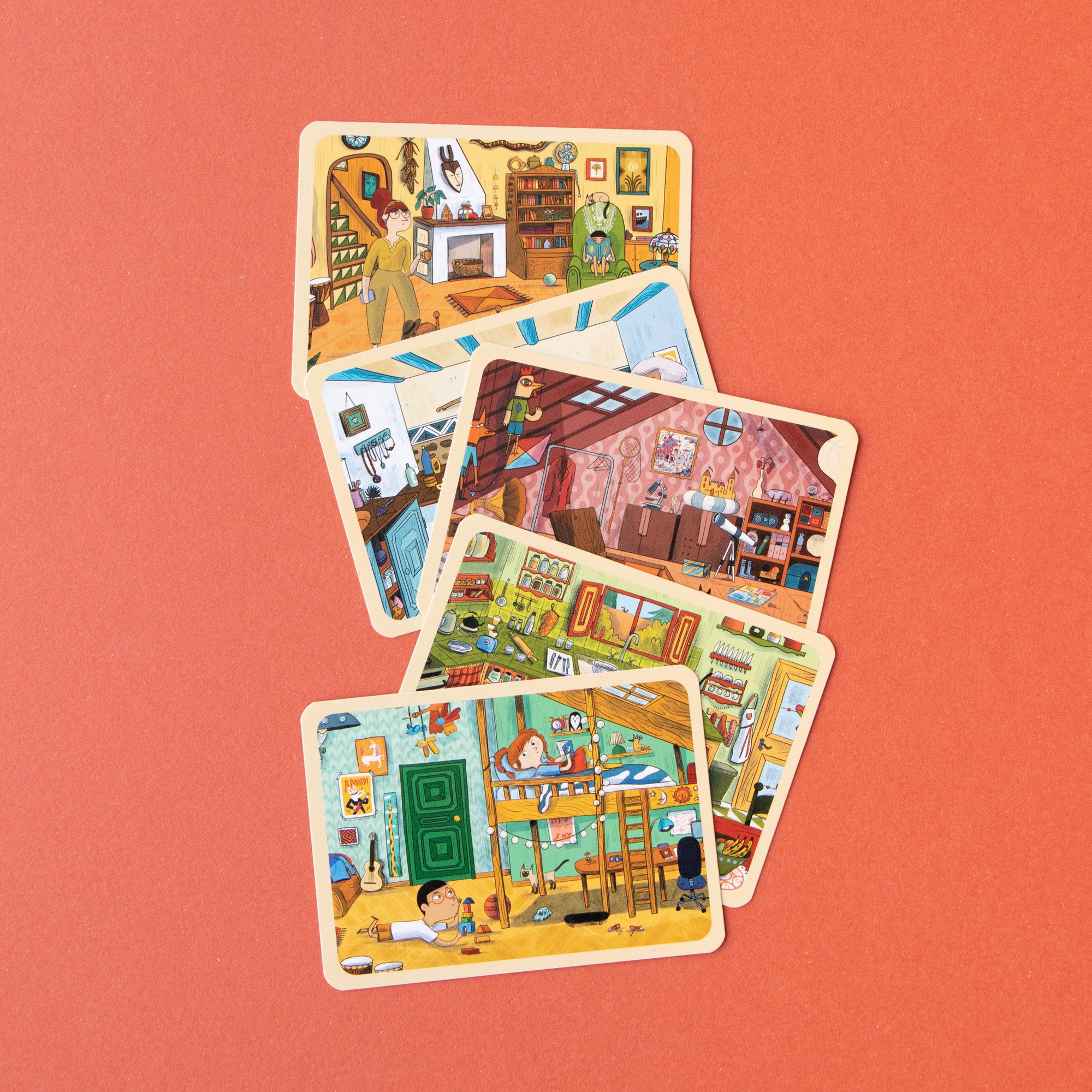 Set of illustrated cards with different room scenes on a red background