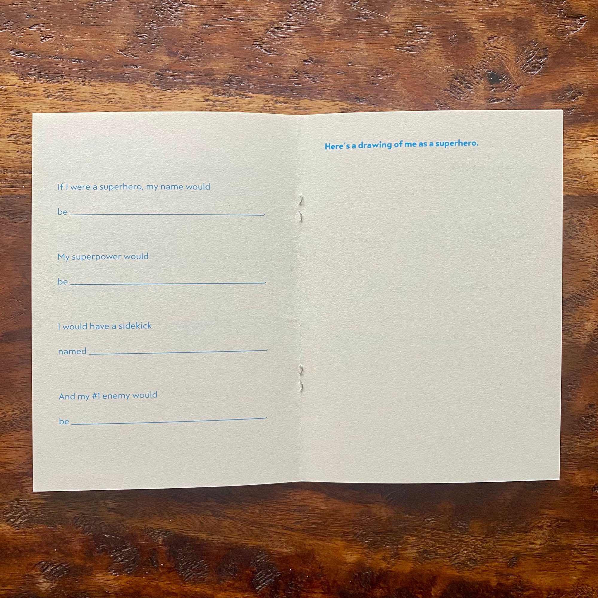 Blank questionnaire paper on a wooden surface