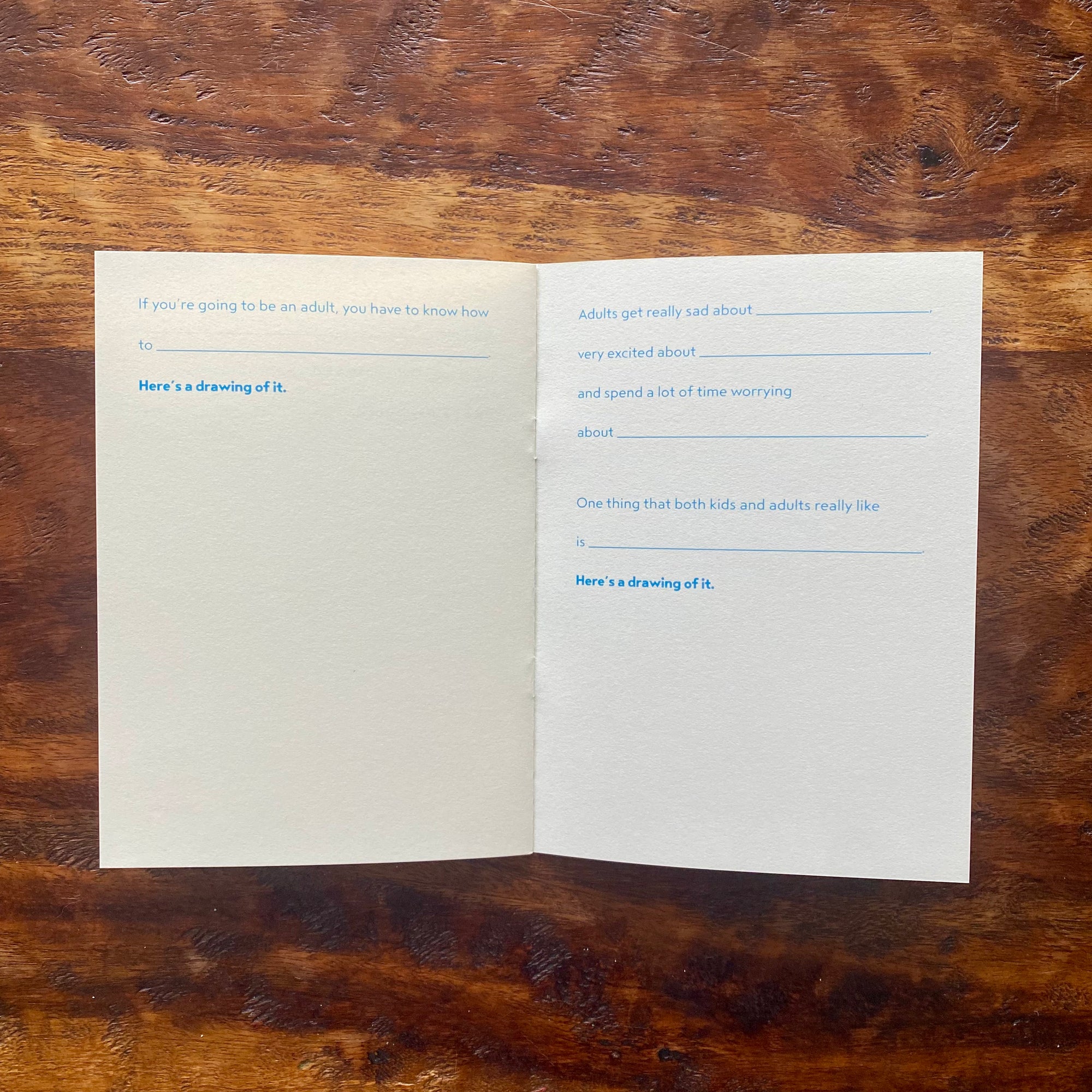 Open book with text on a wooden surface