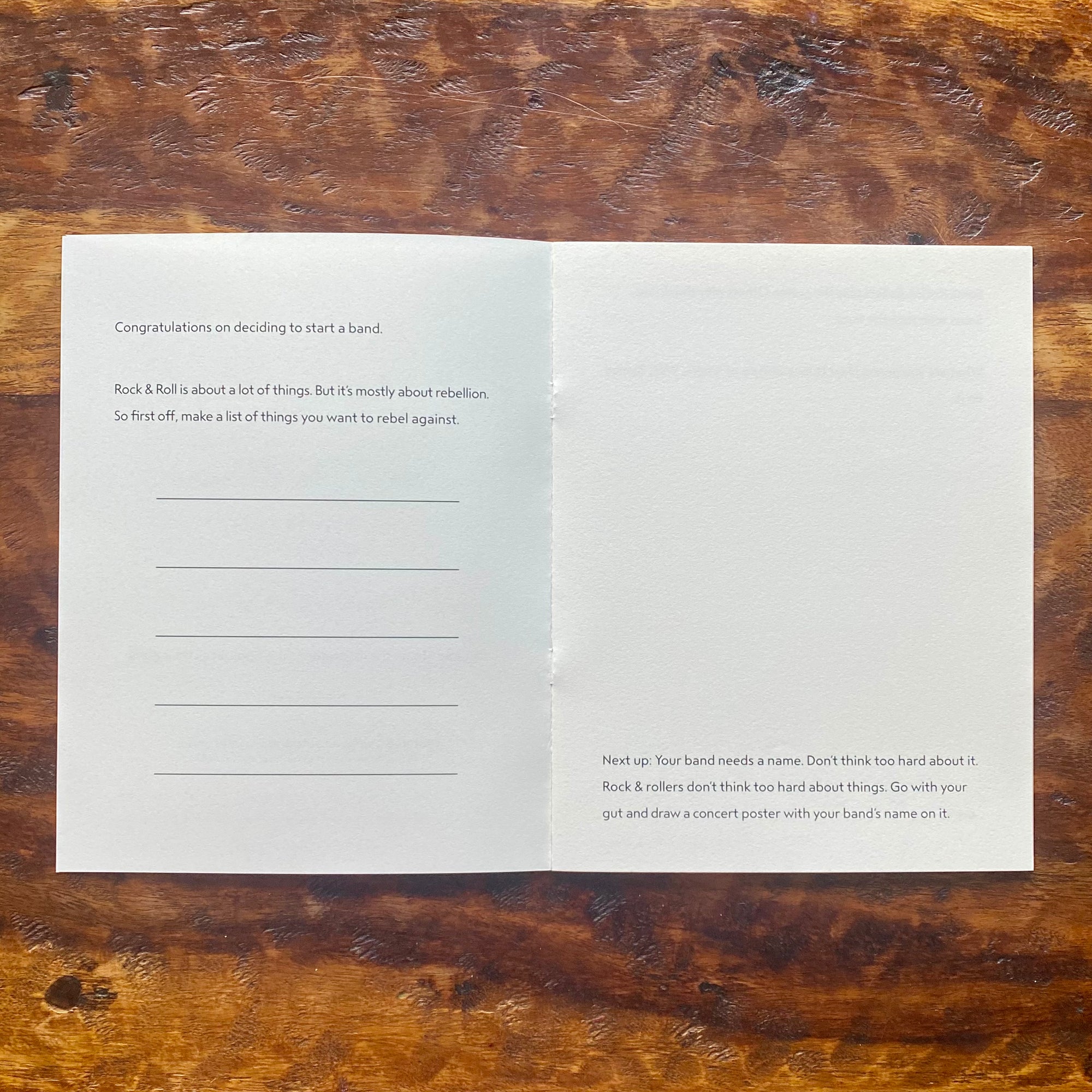 Open book with text on a wooden surface
