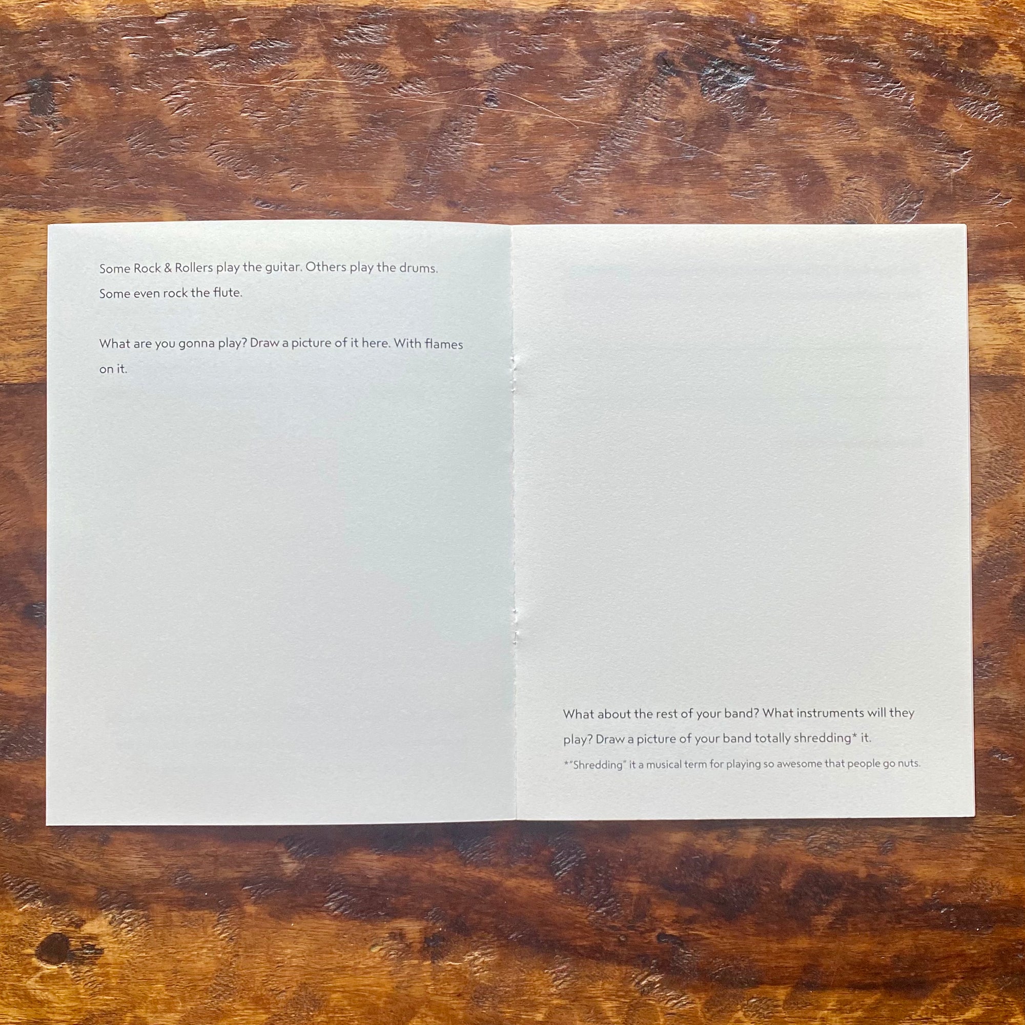 Open book with text on a wooden surface