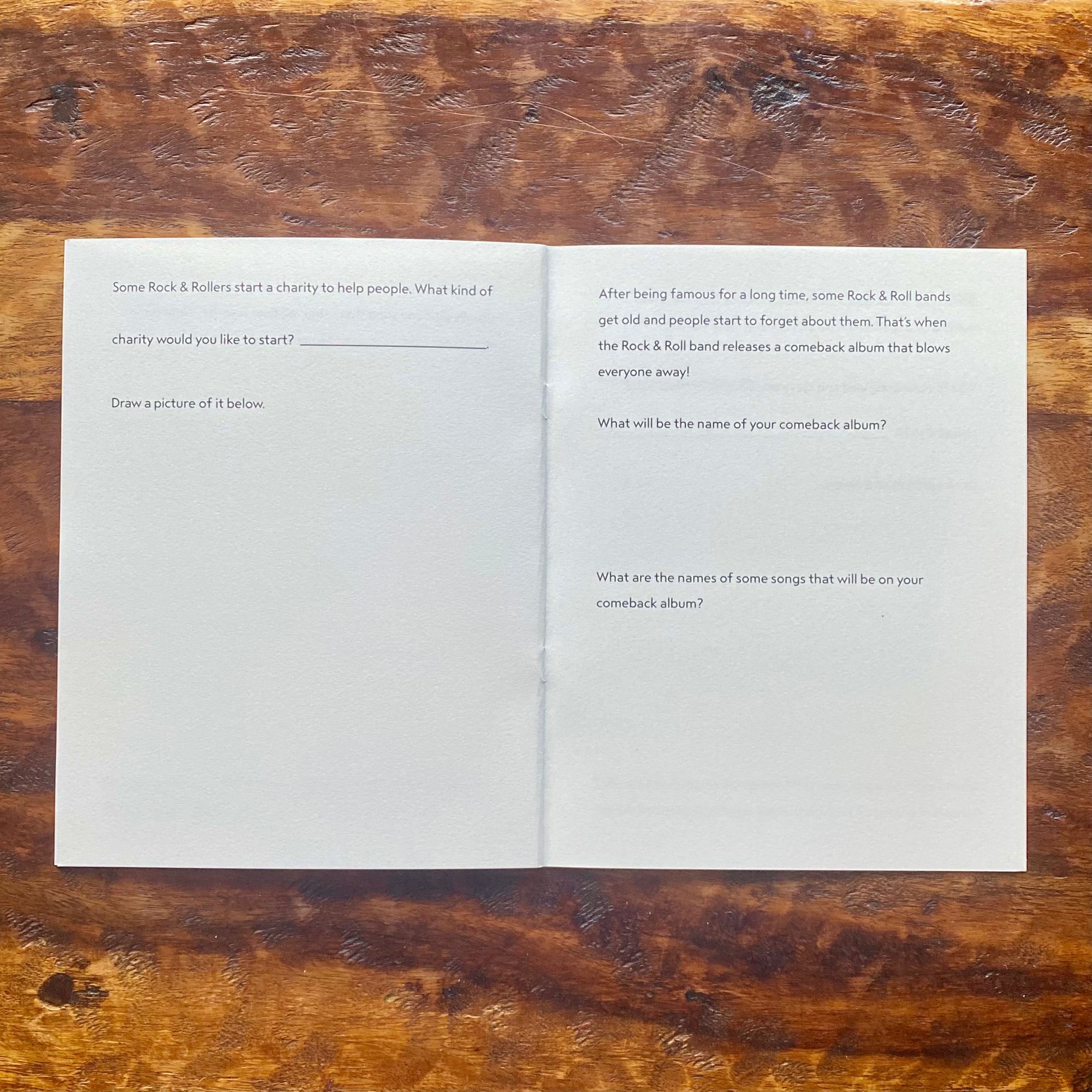 Open book with printed text on a wooden surface