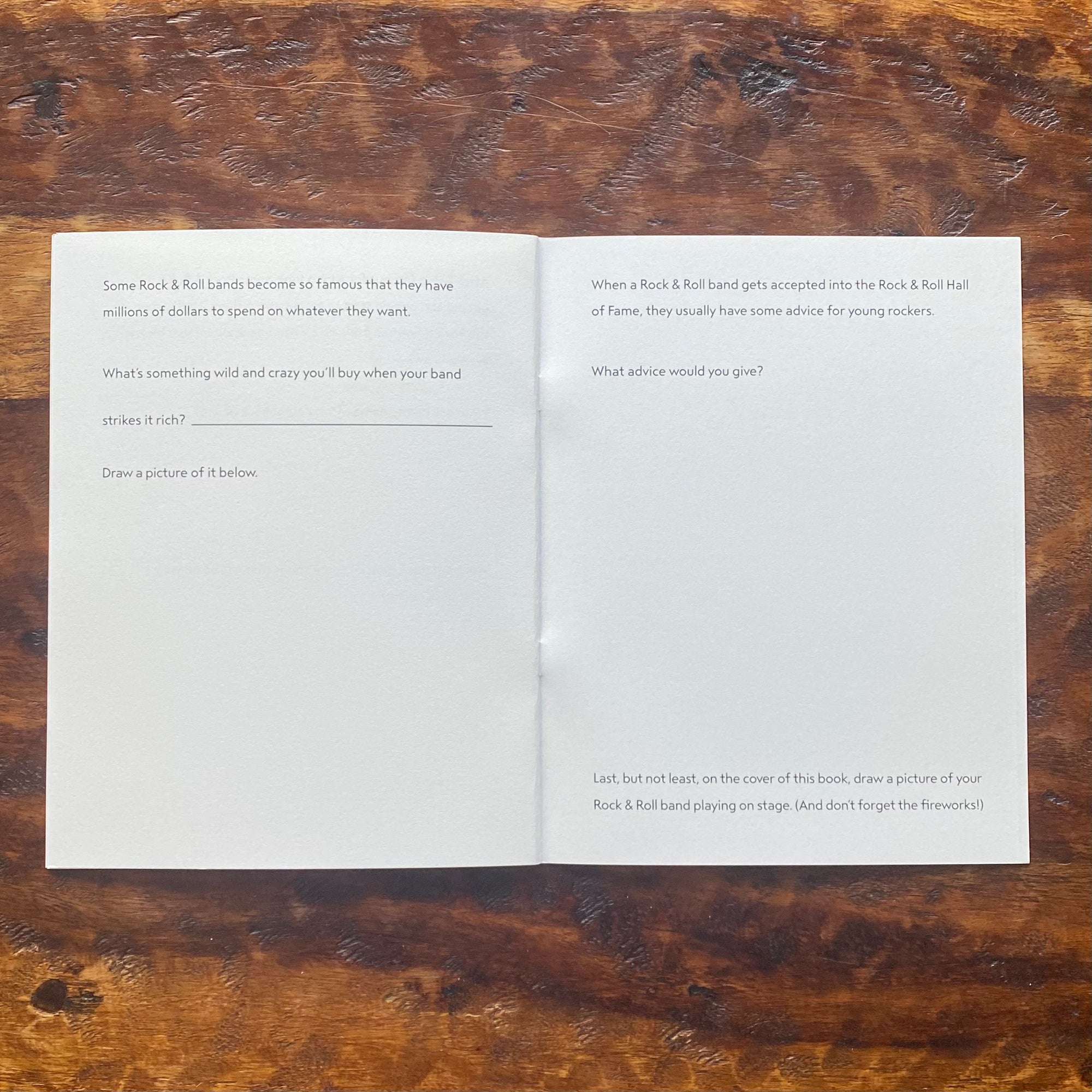Open book with text on a wooden surface