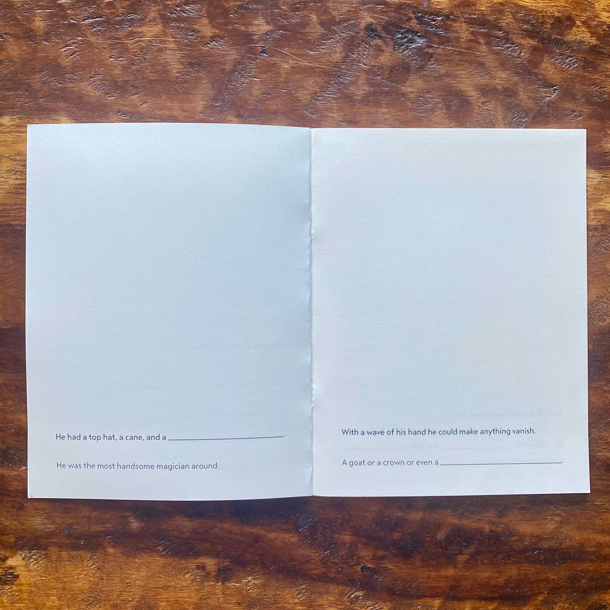 Open book with text on a wooden surface