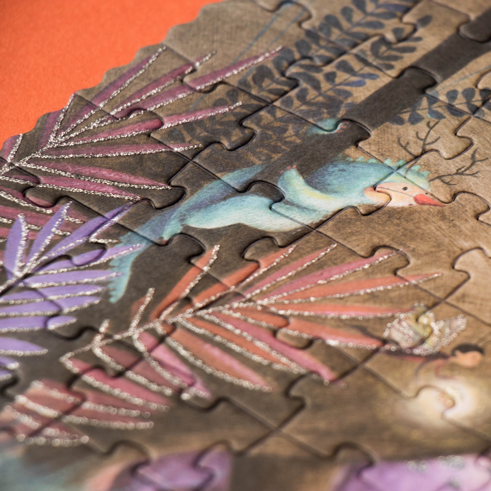 Close-up of a partially completed puzzle with colorful design