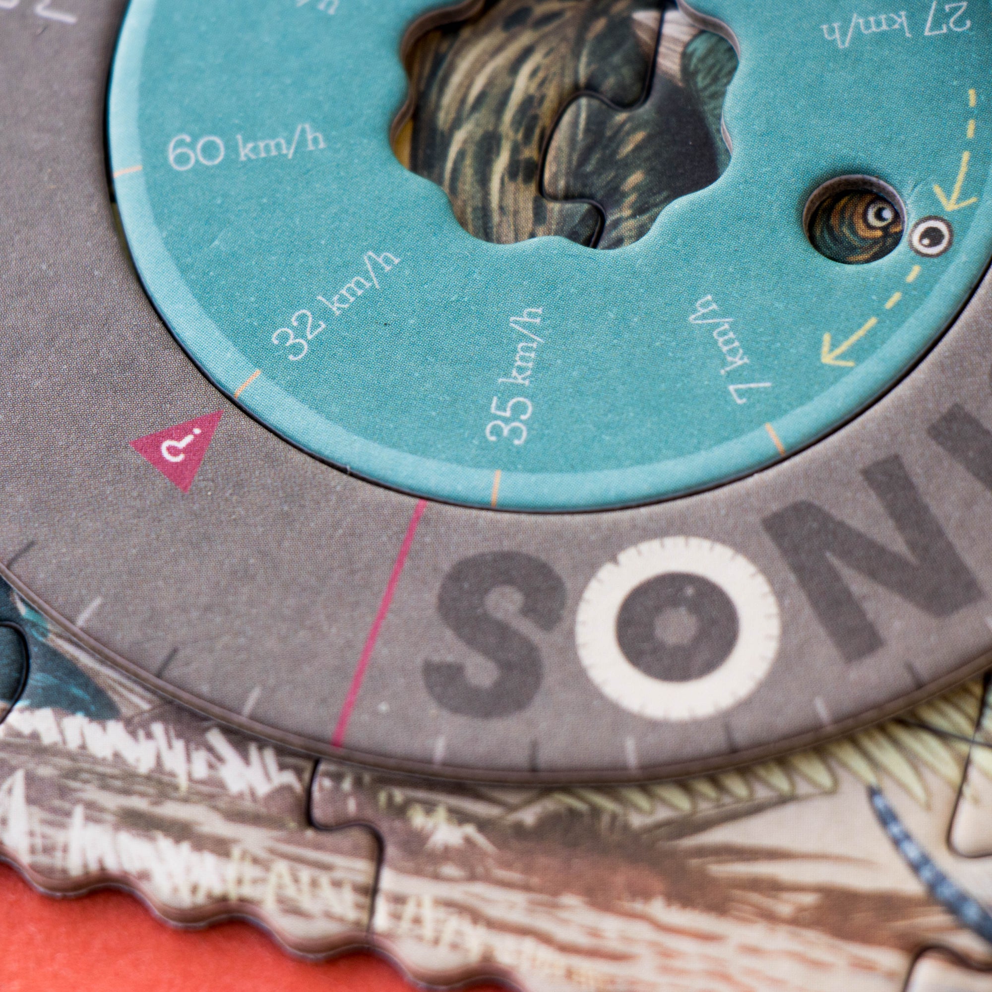 Close-up of a puzzle with a circular design featuring a brand logo.