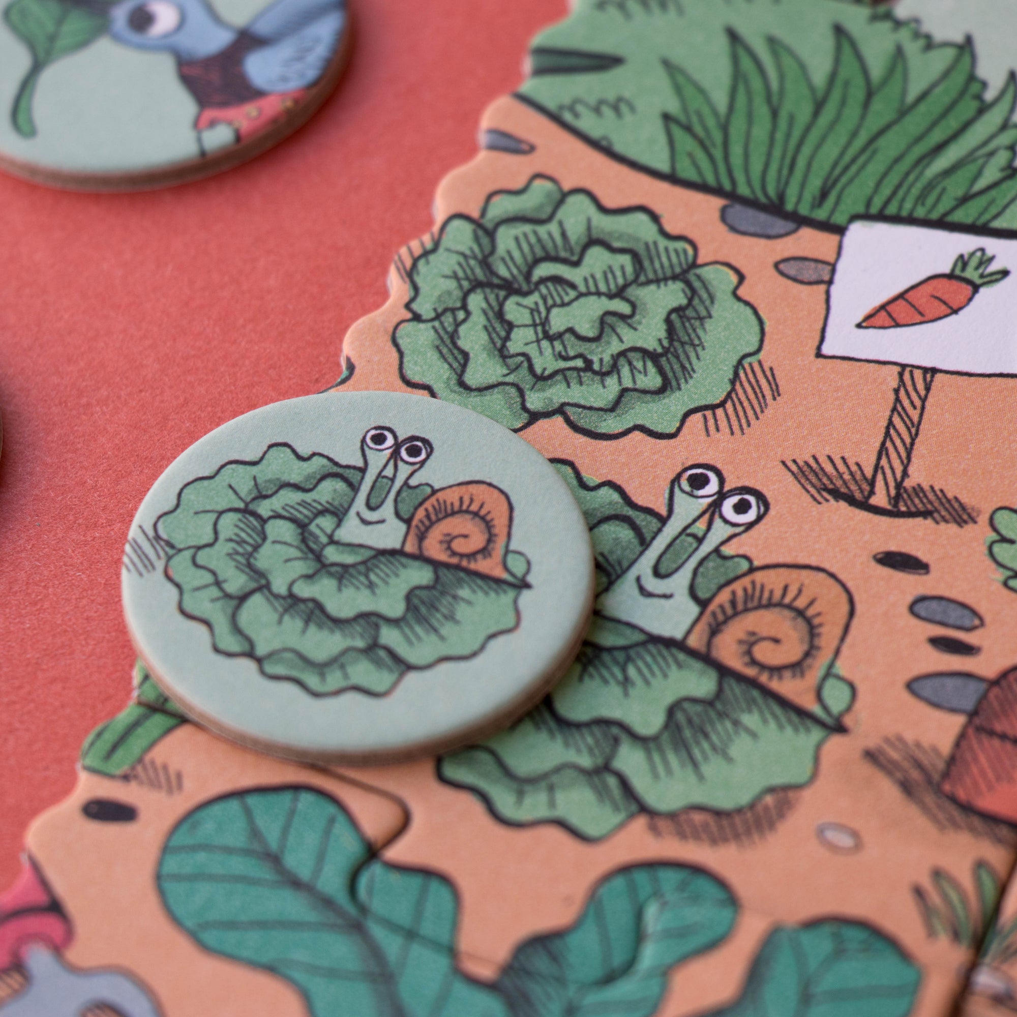 Colorful buttons with garden-themed designs on a matching card