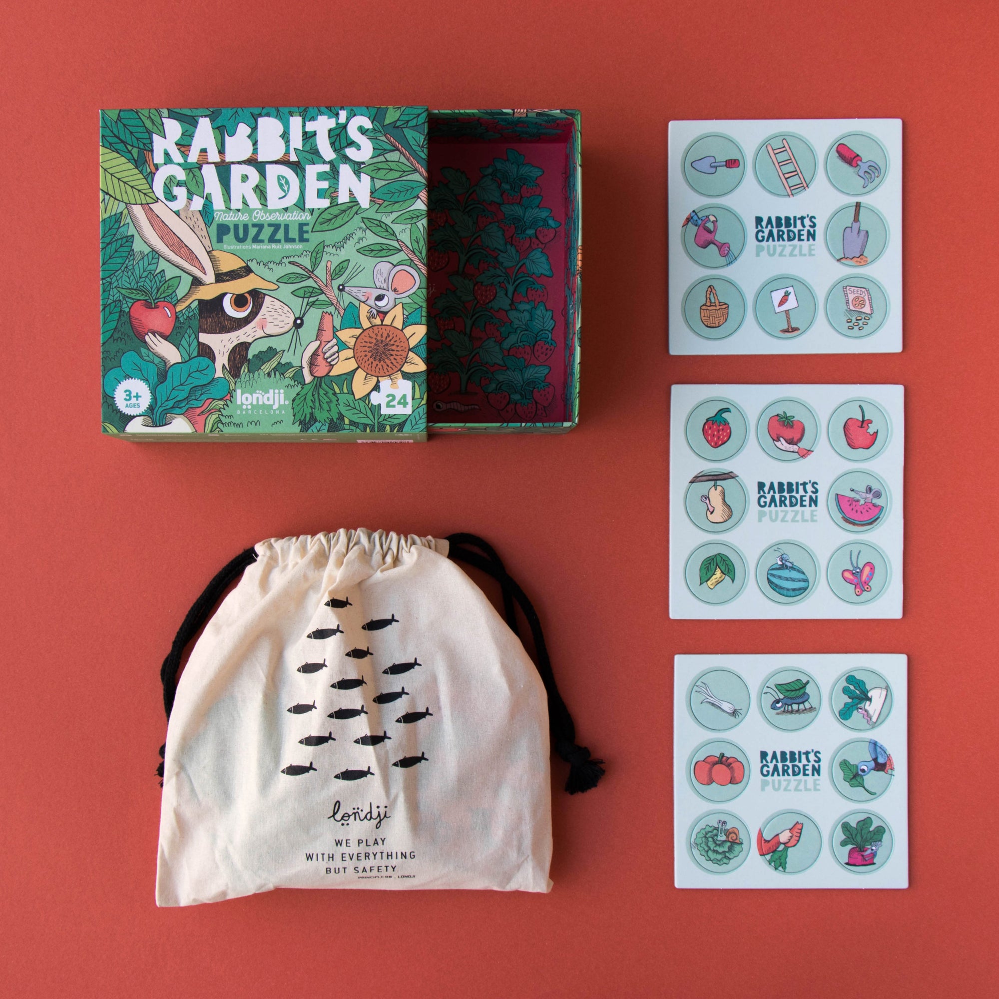 Educational children's pieces including a puzzle, drawstring bag, and disc sheets on a red background