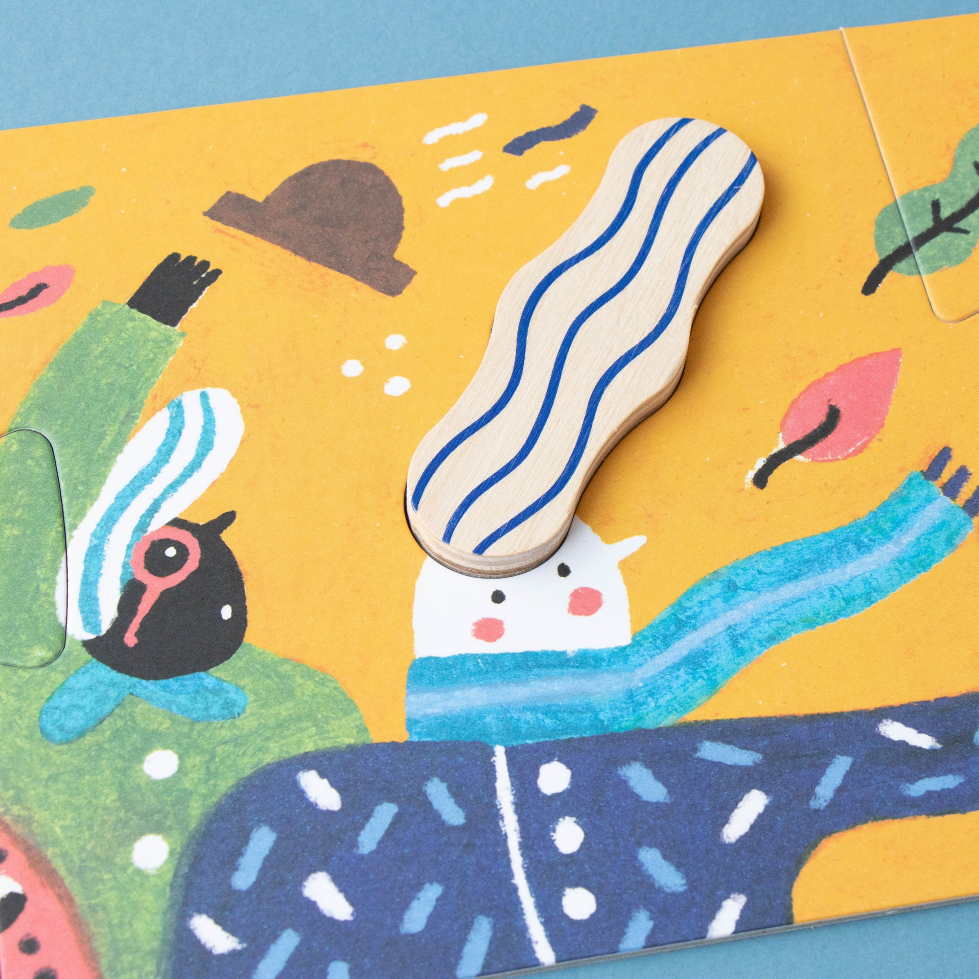 Children's puzzle with colorful characters on a yellow background