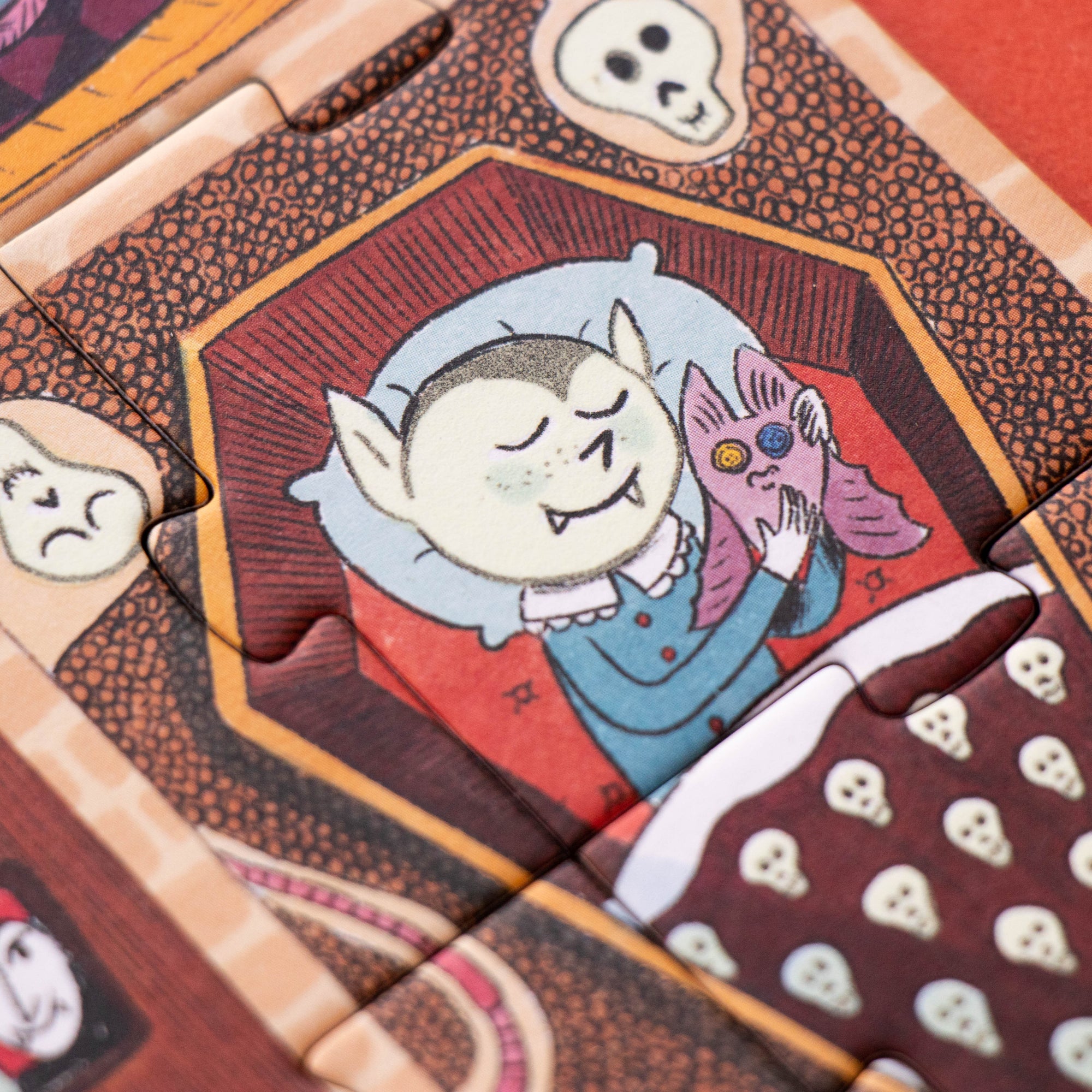 Close-up of a puzzle with a character holding a cat, surrounded by other puzzle pieces on a red background.