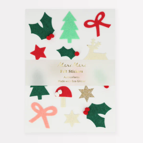 Sheets of felt Christmas icon stickers including shapes of a reindeer, tree, present, and holly, with pom pom embellishments and glitter details.