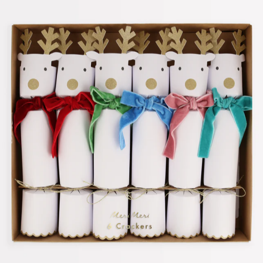 A set of six Christmas crackers with reindeer heads and velvet bows in various colors such as red, green, pink, blue, and gold.