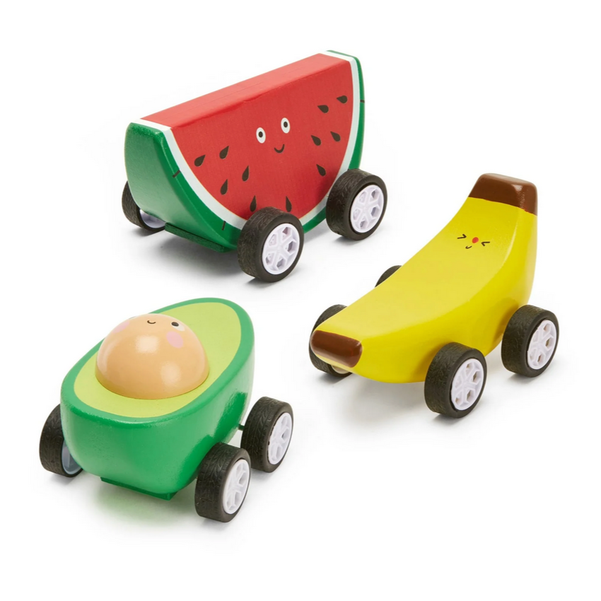 A set of three wooden pullback toy cars designed to look like fruits, with a watermelon, banana, and avocado design.