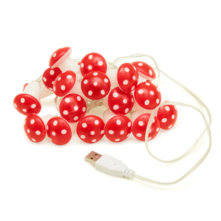 A set of red mushroom-shaped LED string lights with white dots, connected by a white USB cable.